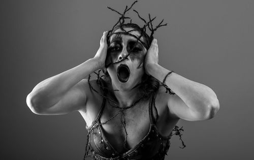 Free A striking black and white portrait capturing intense emotion and expressionist style. Stock Photo