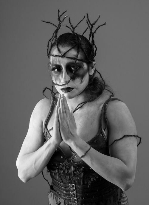 Free Dramatic black and white portrait of a woman in gothic fantasy costume with elaborate makeup. Stock Photo