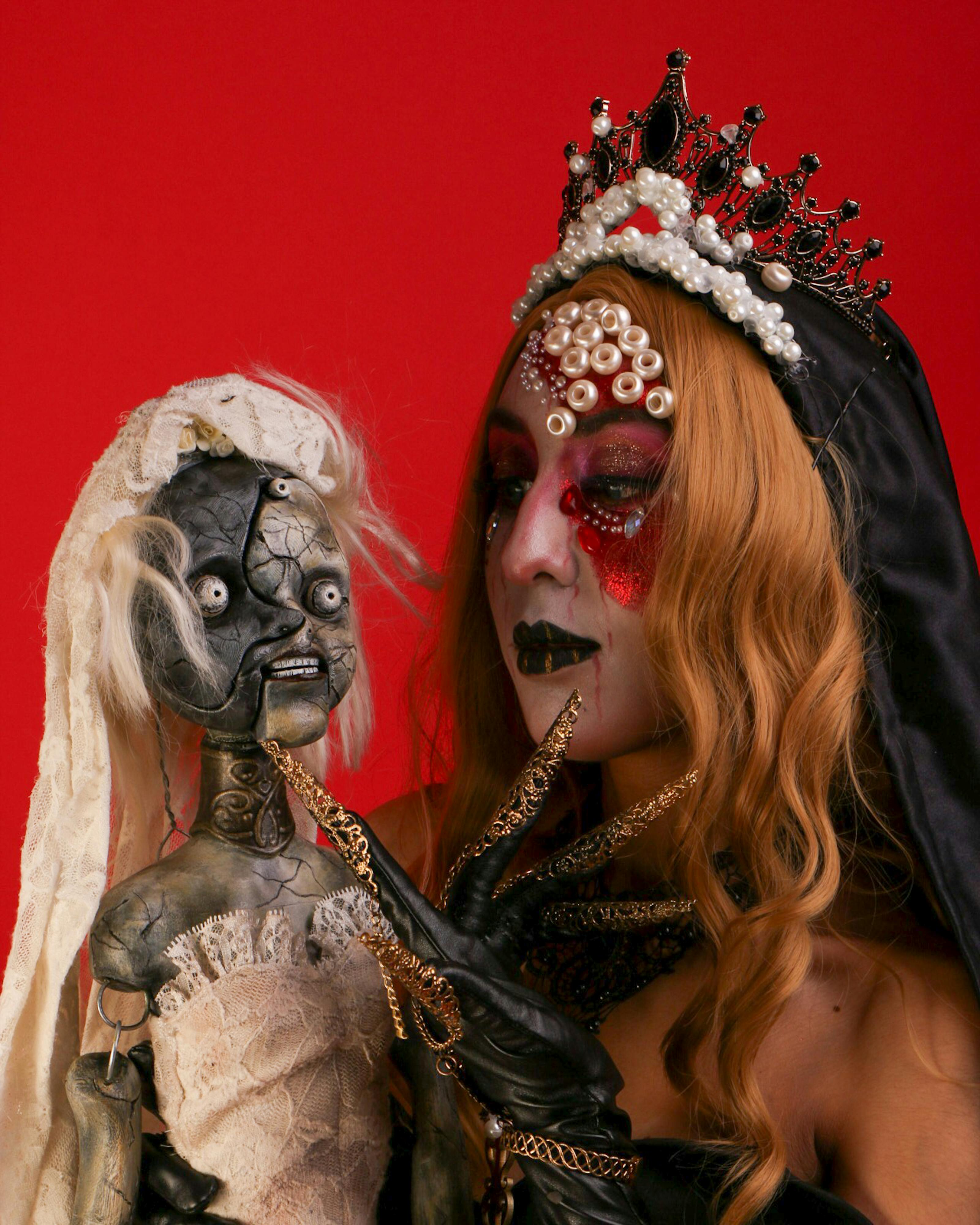 gothic queen with artistic doll on red background