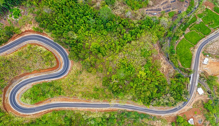 A Zigzagging Road In A Mountain