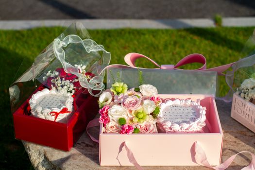 Beautifully packaged floral gift boxes with elegant decorations for special occasions.