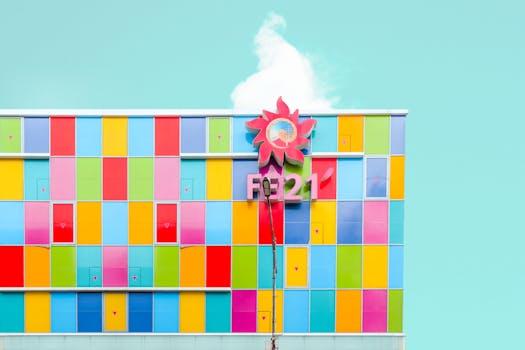 Vibrant geometric facade of a modern building with colorful panels and creative design.