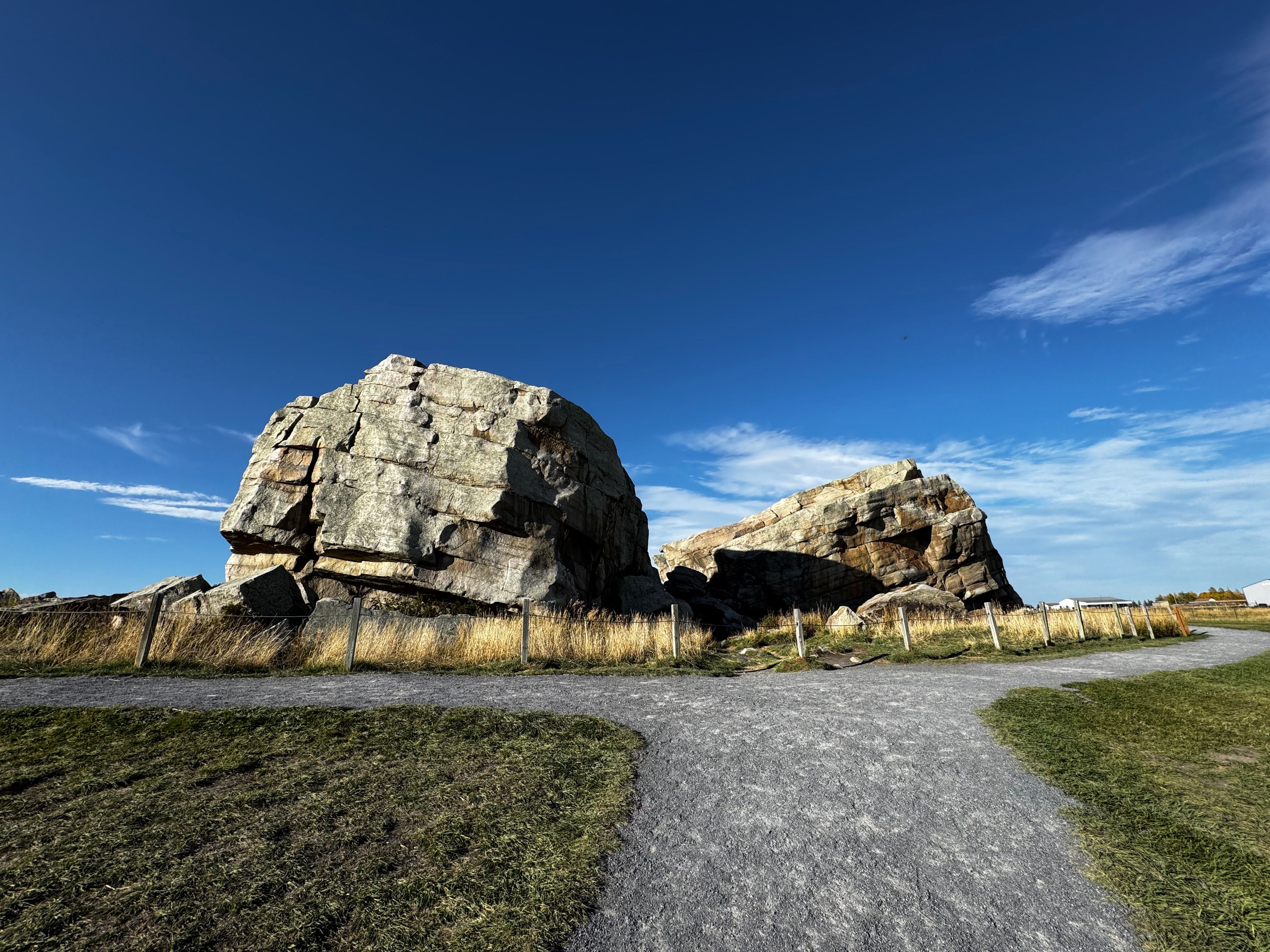 Majestic Rock Formation Under a Clear Blue Sky · Free Stock Photo