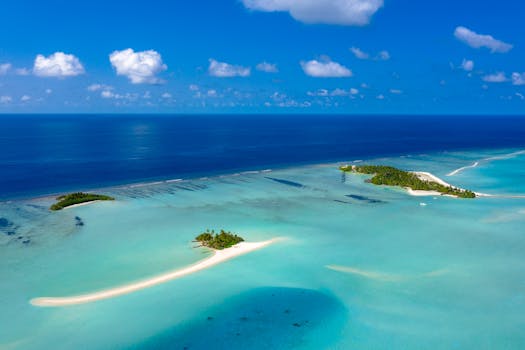Aerial view of serene tropical islands with azure waters in the Maldives.