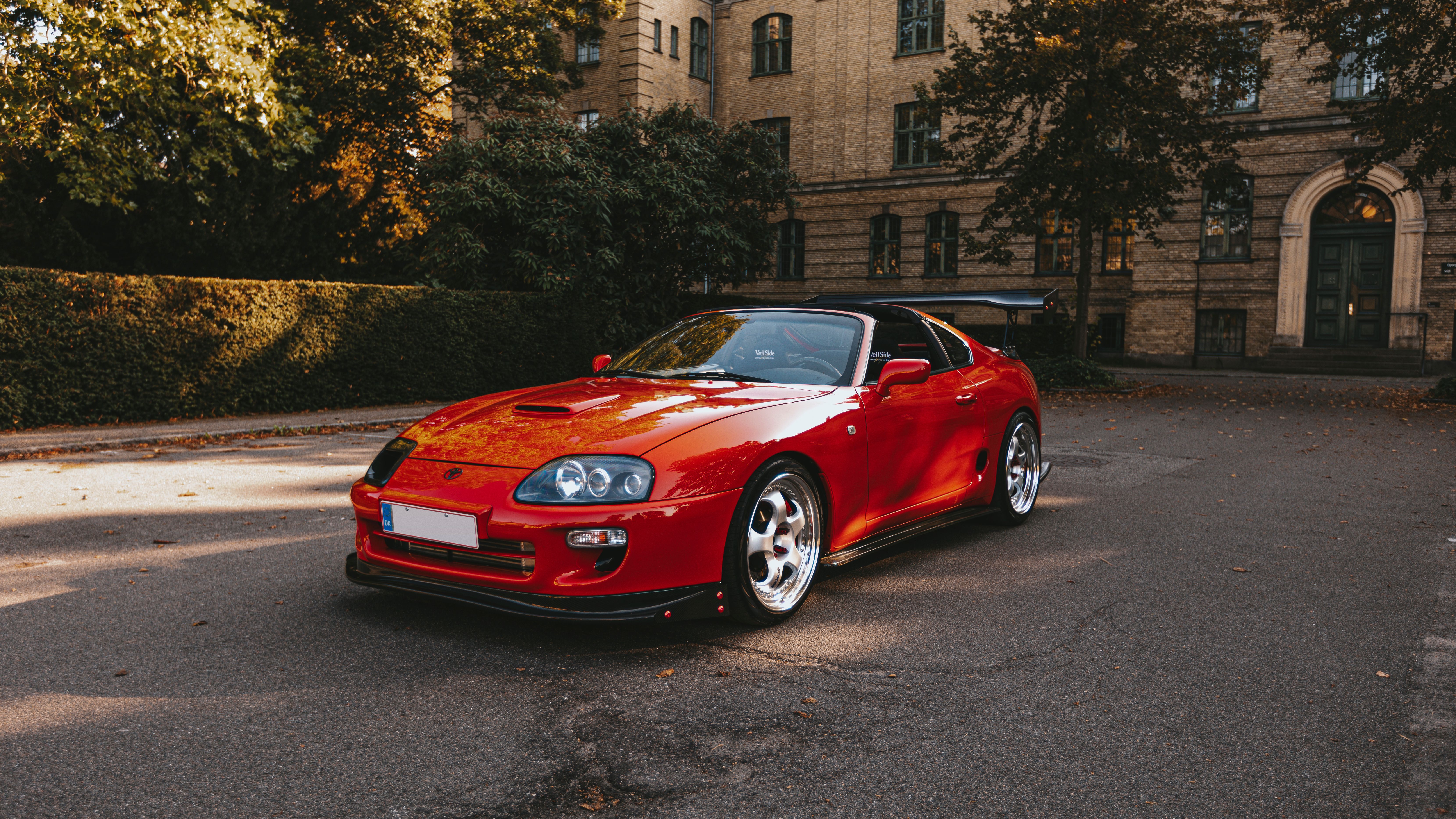 Red Shiny Car Inside a Garage · Free Stock Photo
