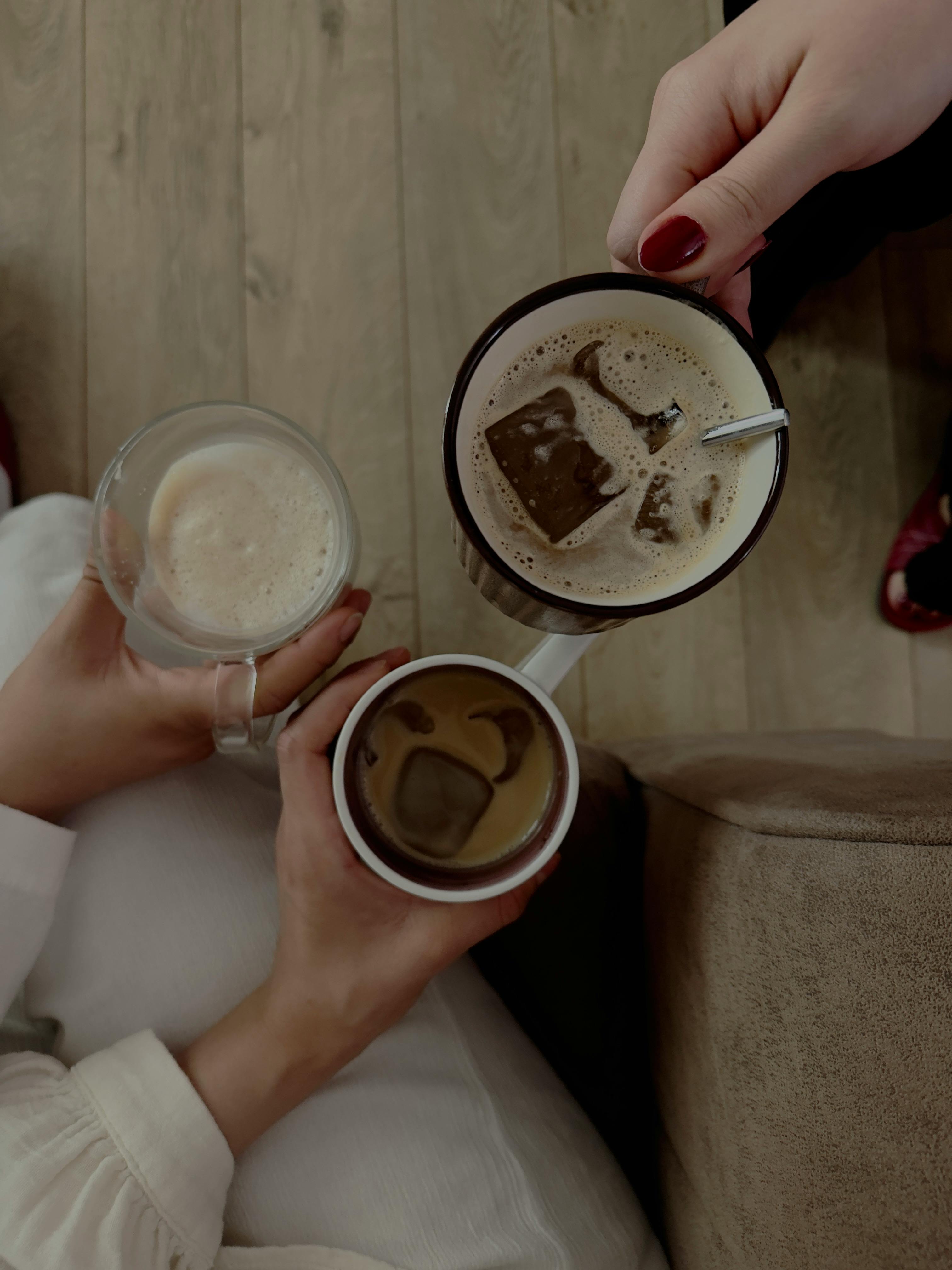 friends enjoying coffee together indoors