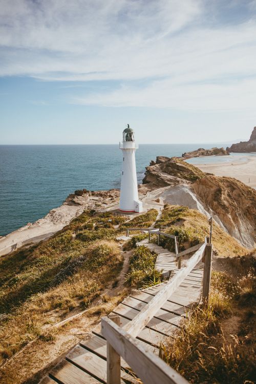 Free Beautiful view of Castlepoint Lighthouse on the North Island coast, New Zealand Stock Photo