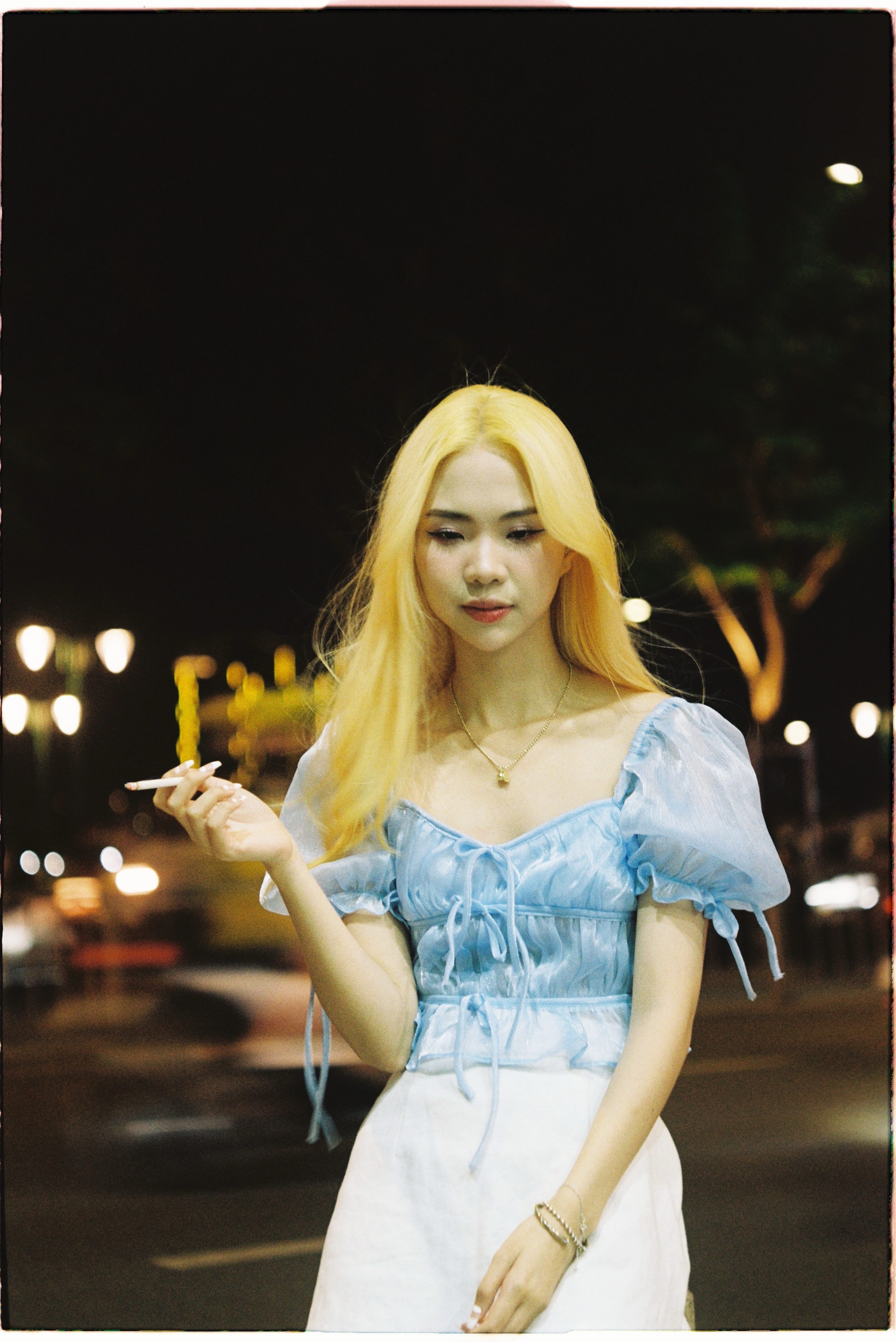 Stylish Woman at Night in Urban Setting · Free Stock Photo