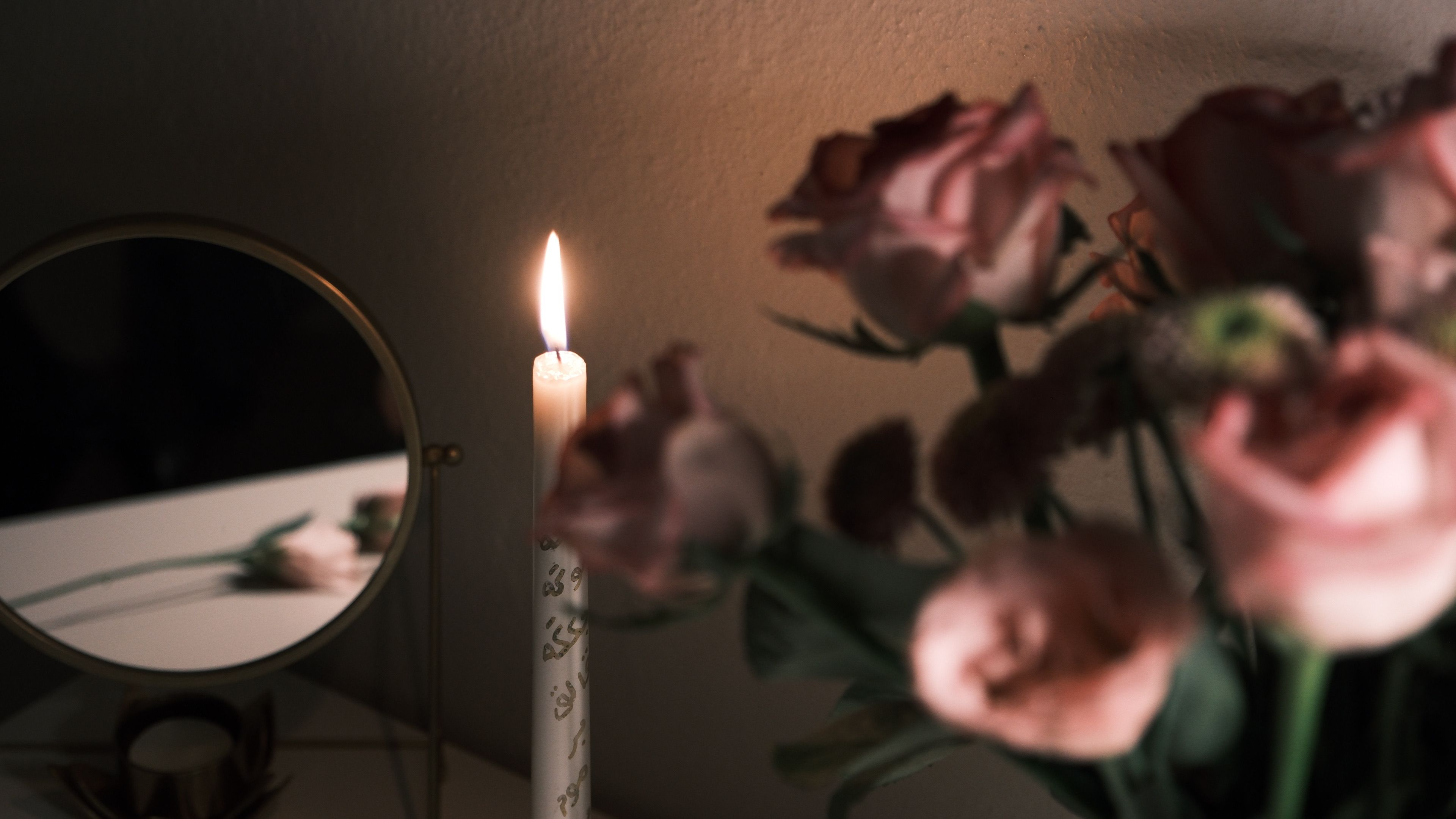 Image showcasing Romantic Candlelit Scene with Roses · Free Stock Photo