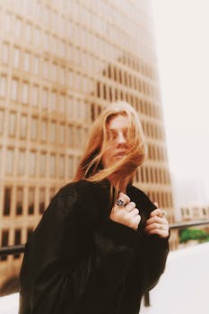 Artistic portrait of a person in New York with cinematic feel and urban backdrop.