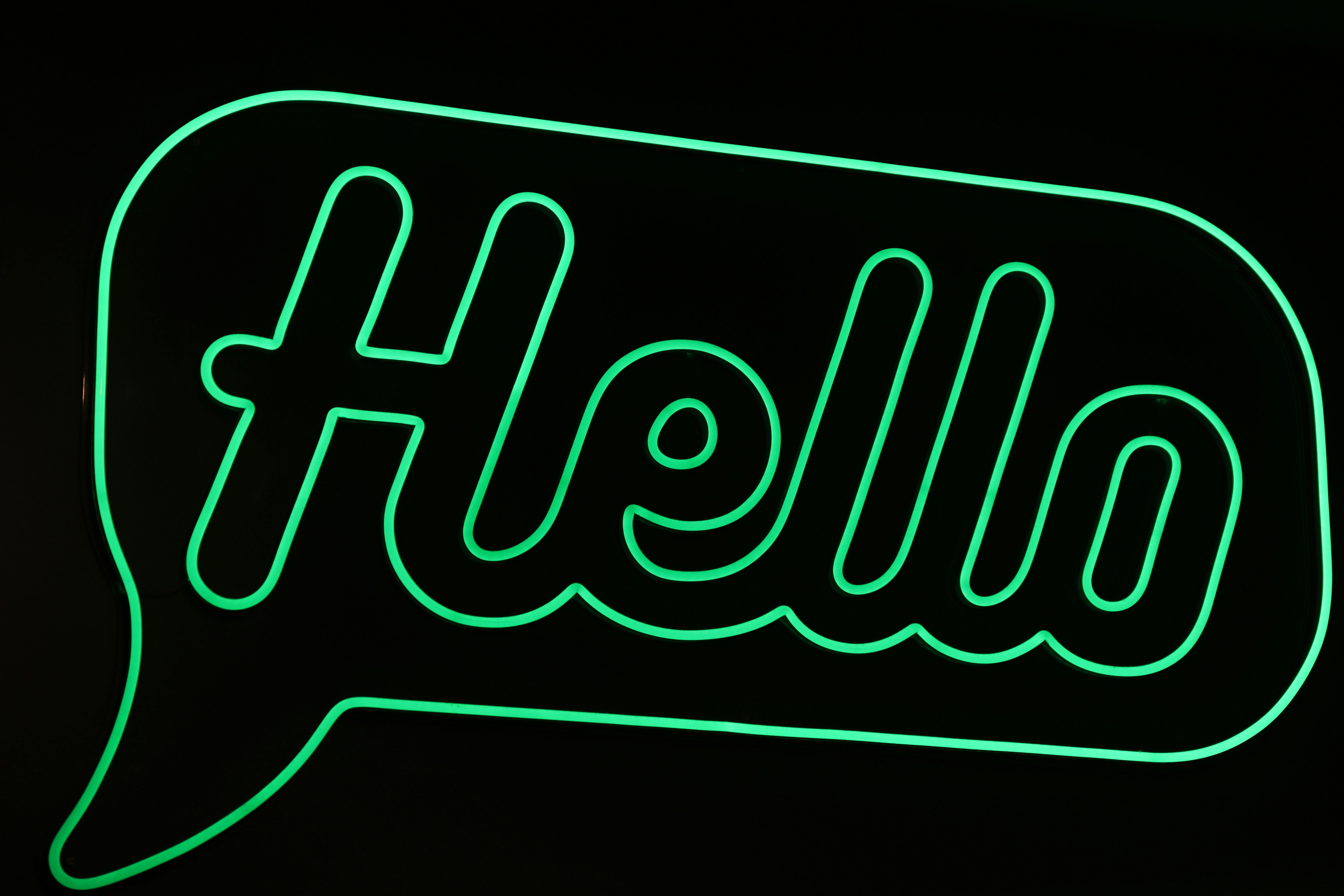 green neon hello sign in catania