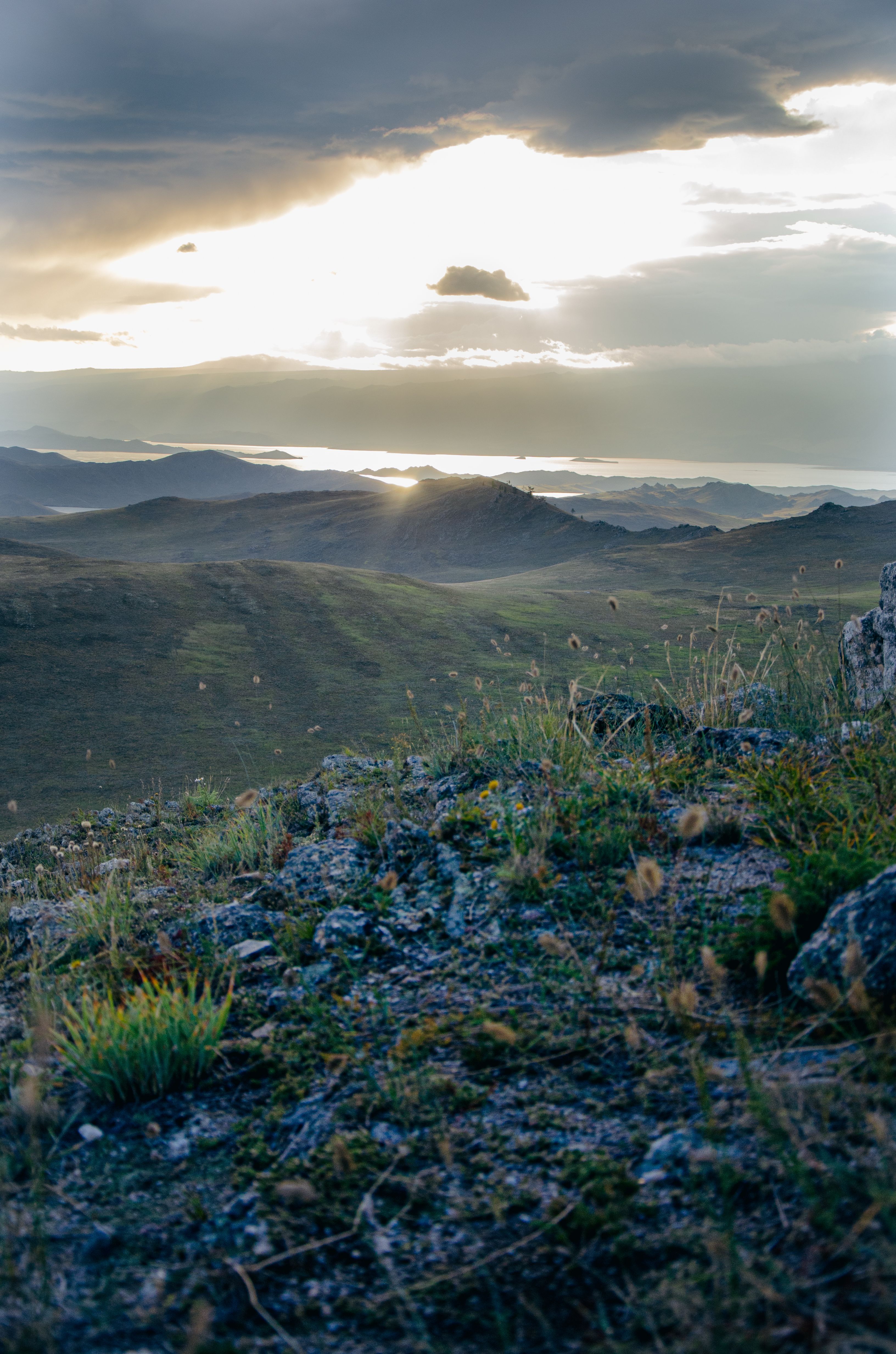 Breathtaking Sunset Over Rolling Hills · Free Stock Photo