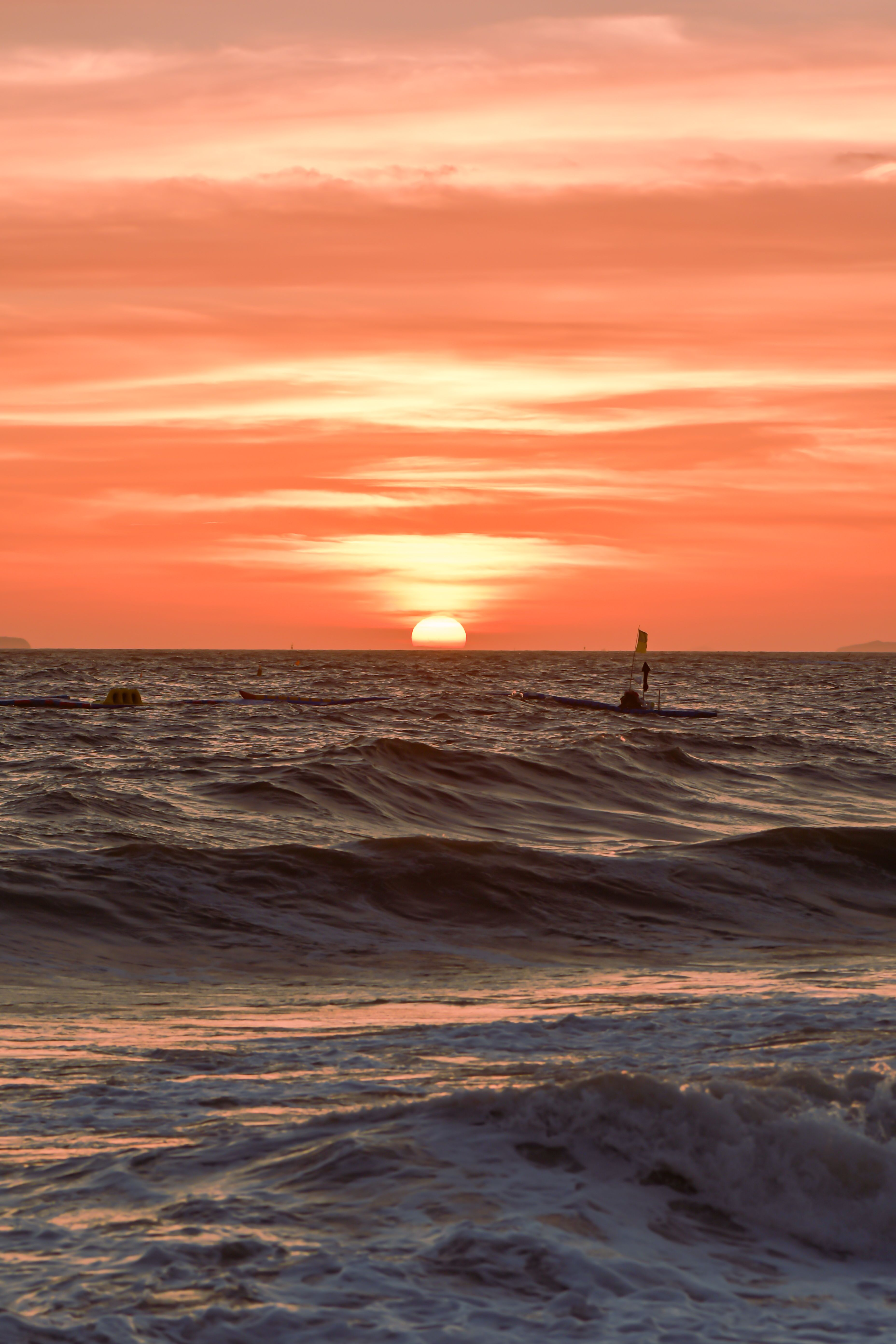 Man Surfing on Sea Waves during Sunset · Free Stock Photo
