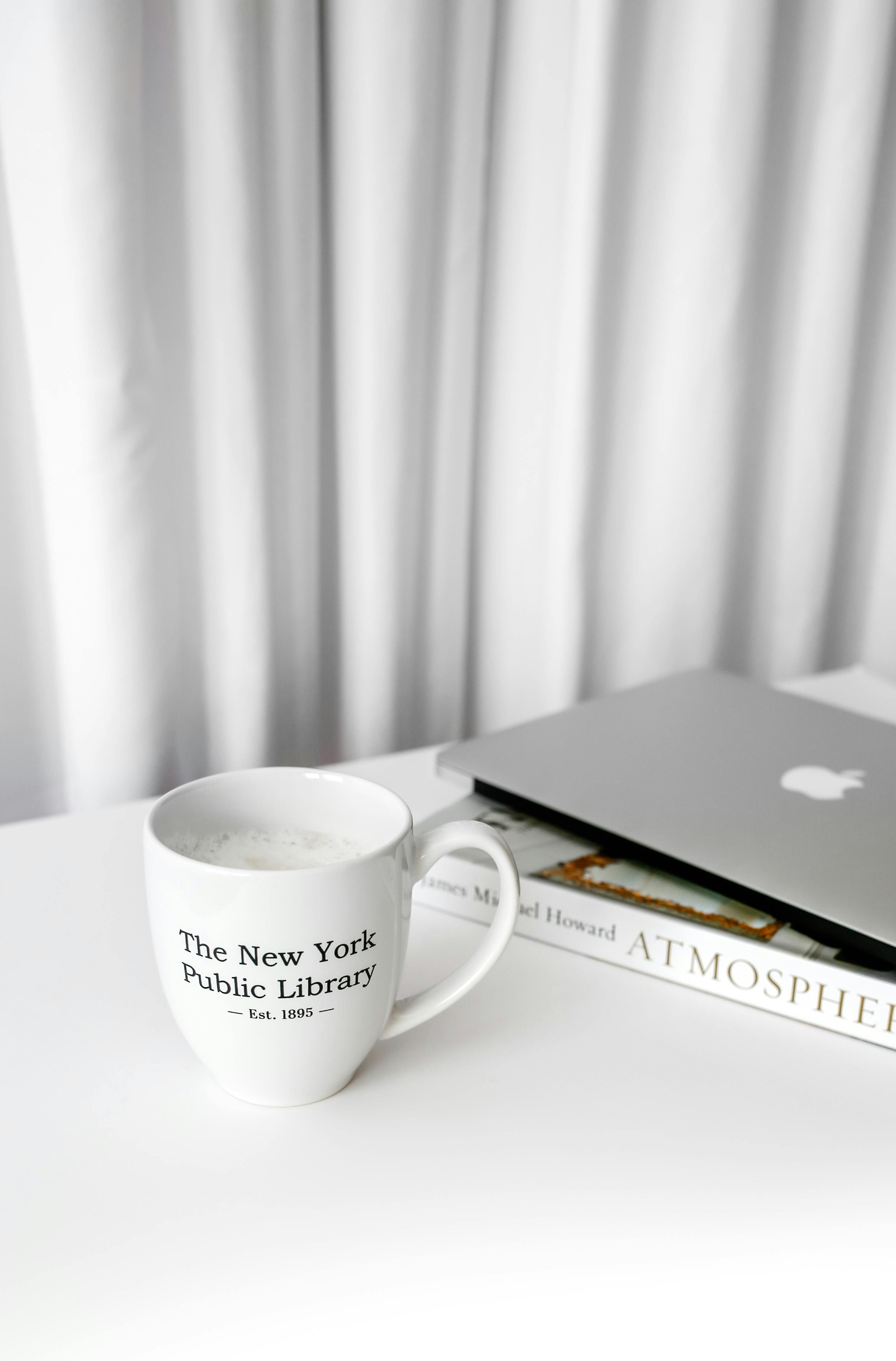 modern workspace with coffee mug and laptop