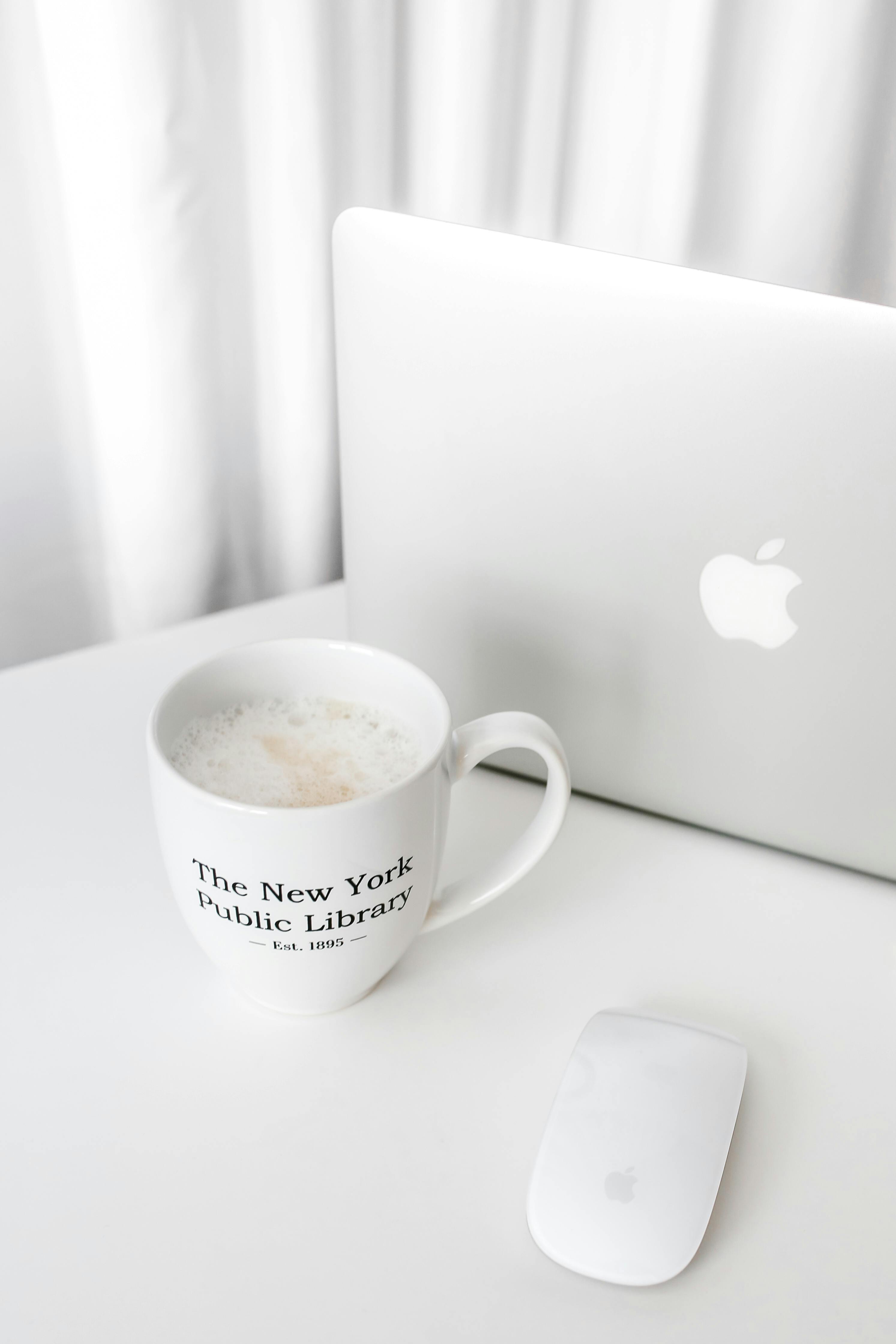 minimal workspace with laptop and coffee mug