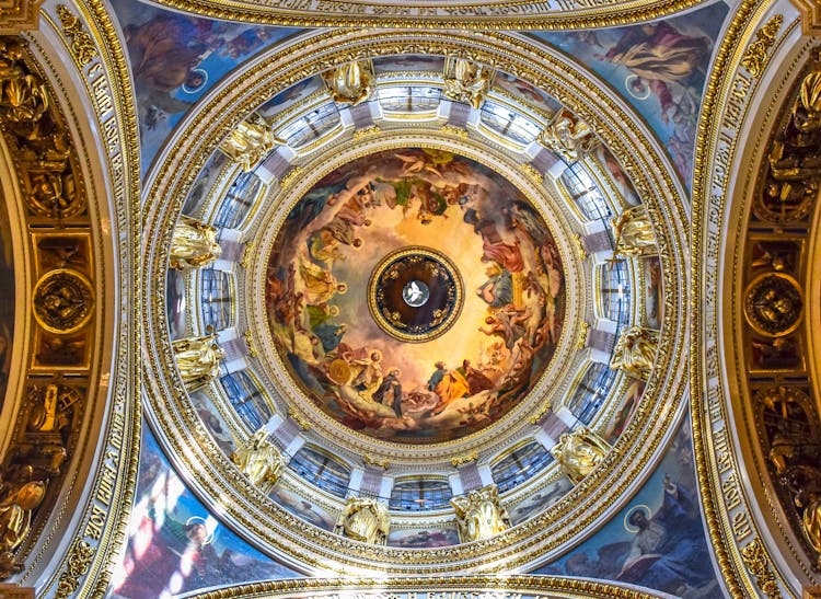 Religious Paintings On A Cathedral's Ceiling