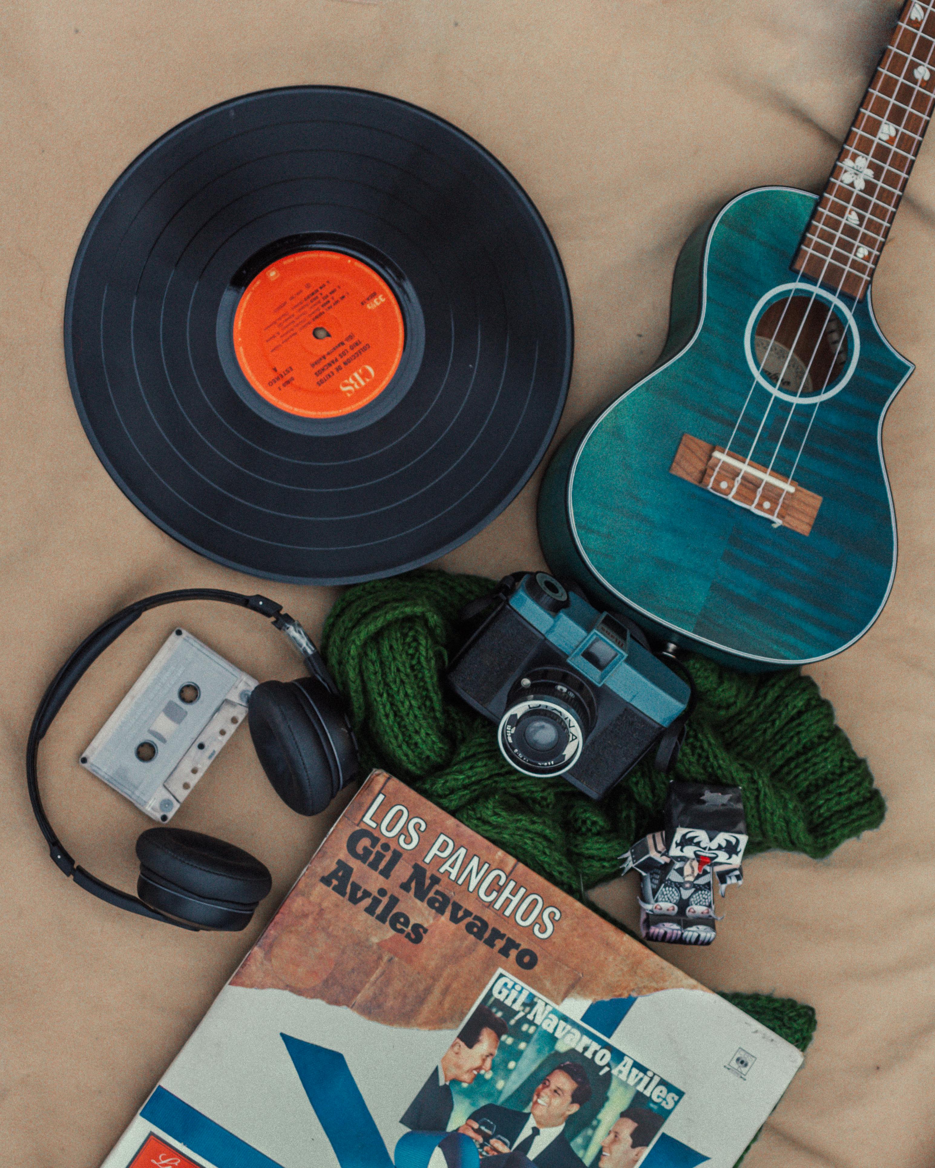 vintage music collection with vinyl and ukulele