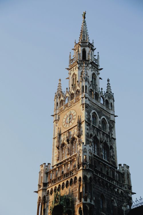 Free A stunning view of the Gothic architecture of Munich's famous clock tower. Stock Photo