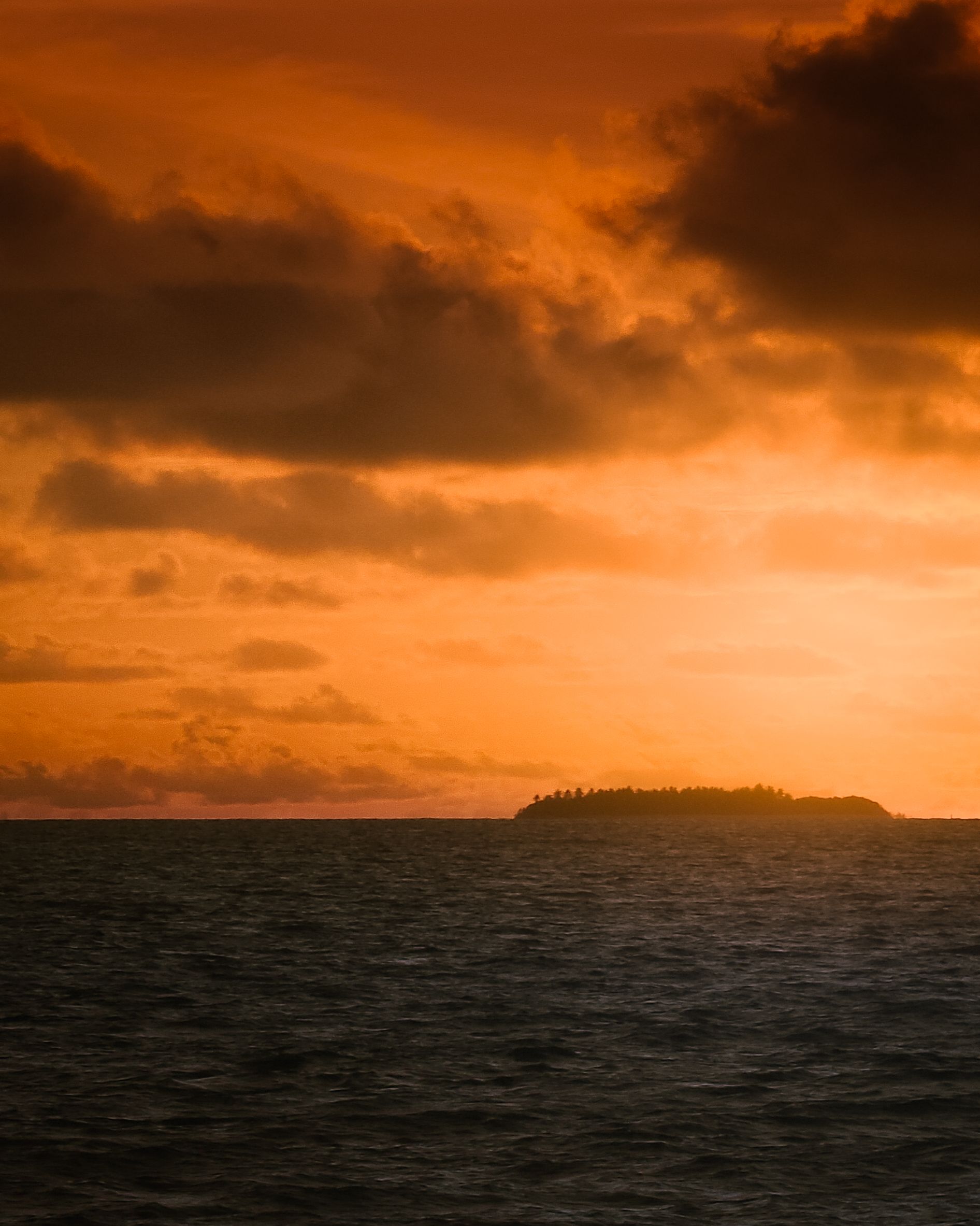Dramatic Ocean Sunset with Island Silhouette · Free Stock Photo