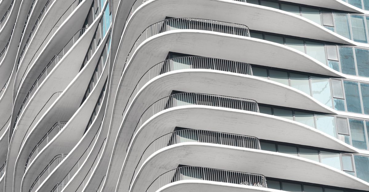 Wavy Building Models Modern Wavy Facade of Skyscraper Architecture · Free Stock Photo