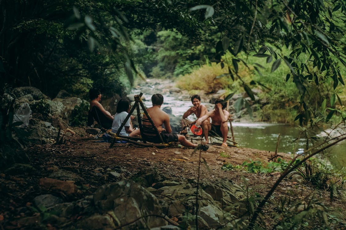 Free Picnic Besides A Forest River Stock Photo