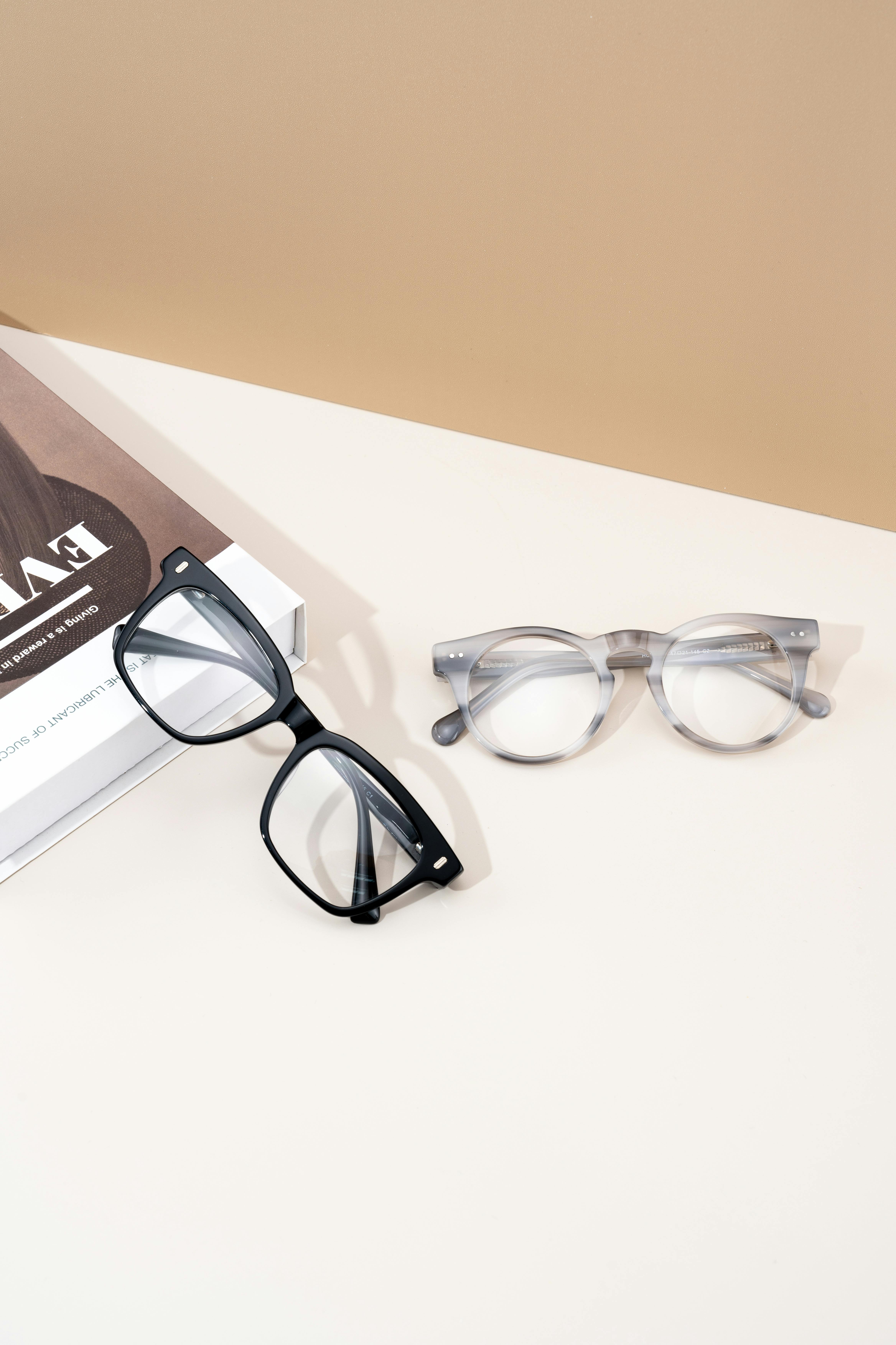 stylish eyeglasses on minimalist beige background