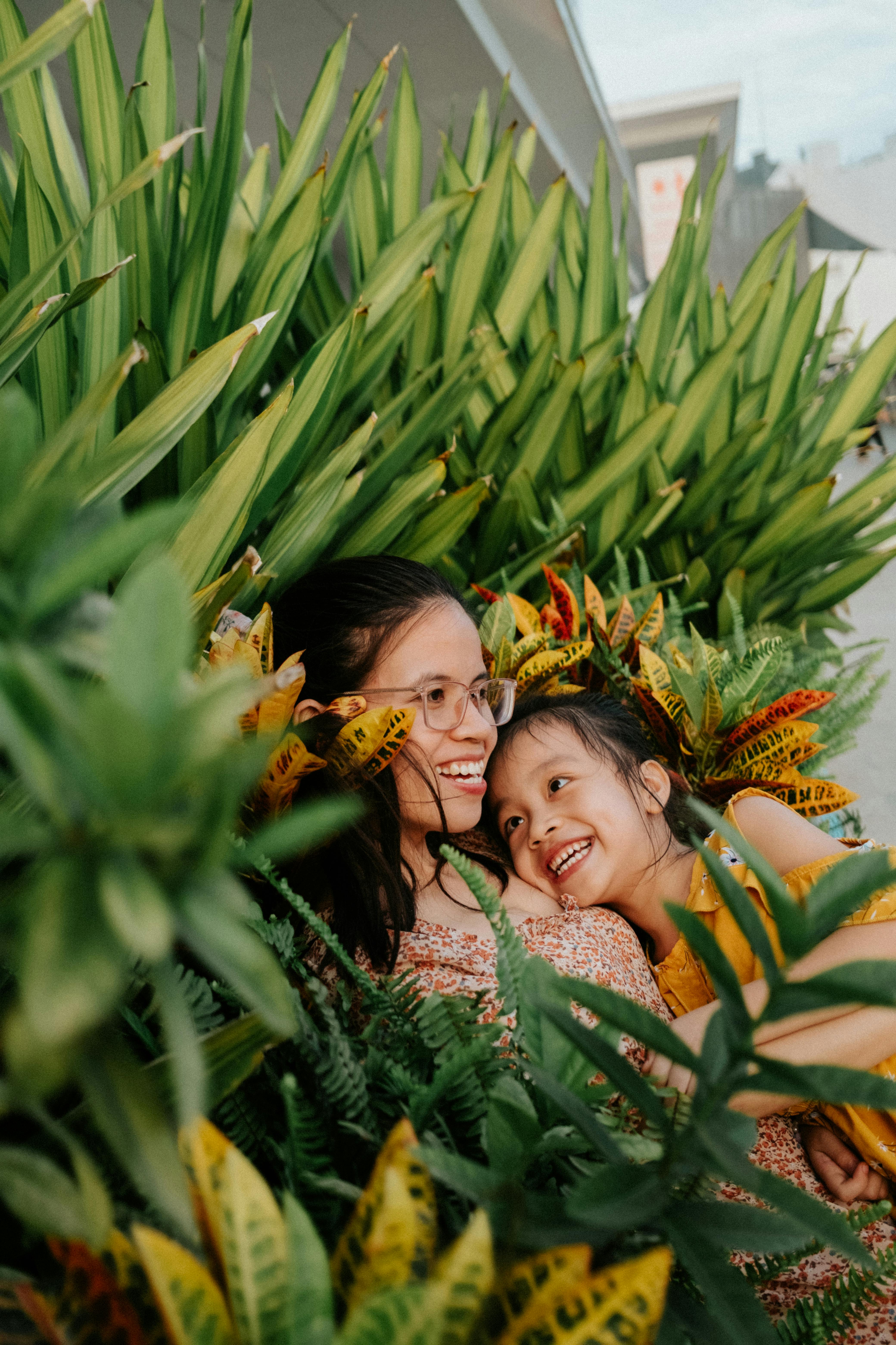 mother and child embraced by nature