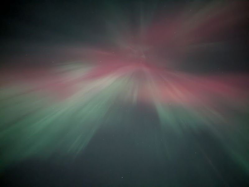 An aurora borealis is seen in the sky · Free Stock Photo