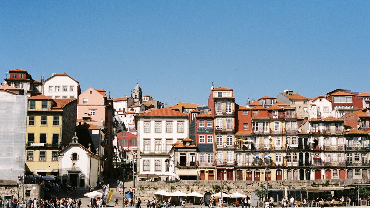 Port wine cellars and boats along the Vila Nova de Gaia waterfront