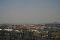 Scenic View of a Rural Village with Wind Turbines