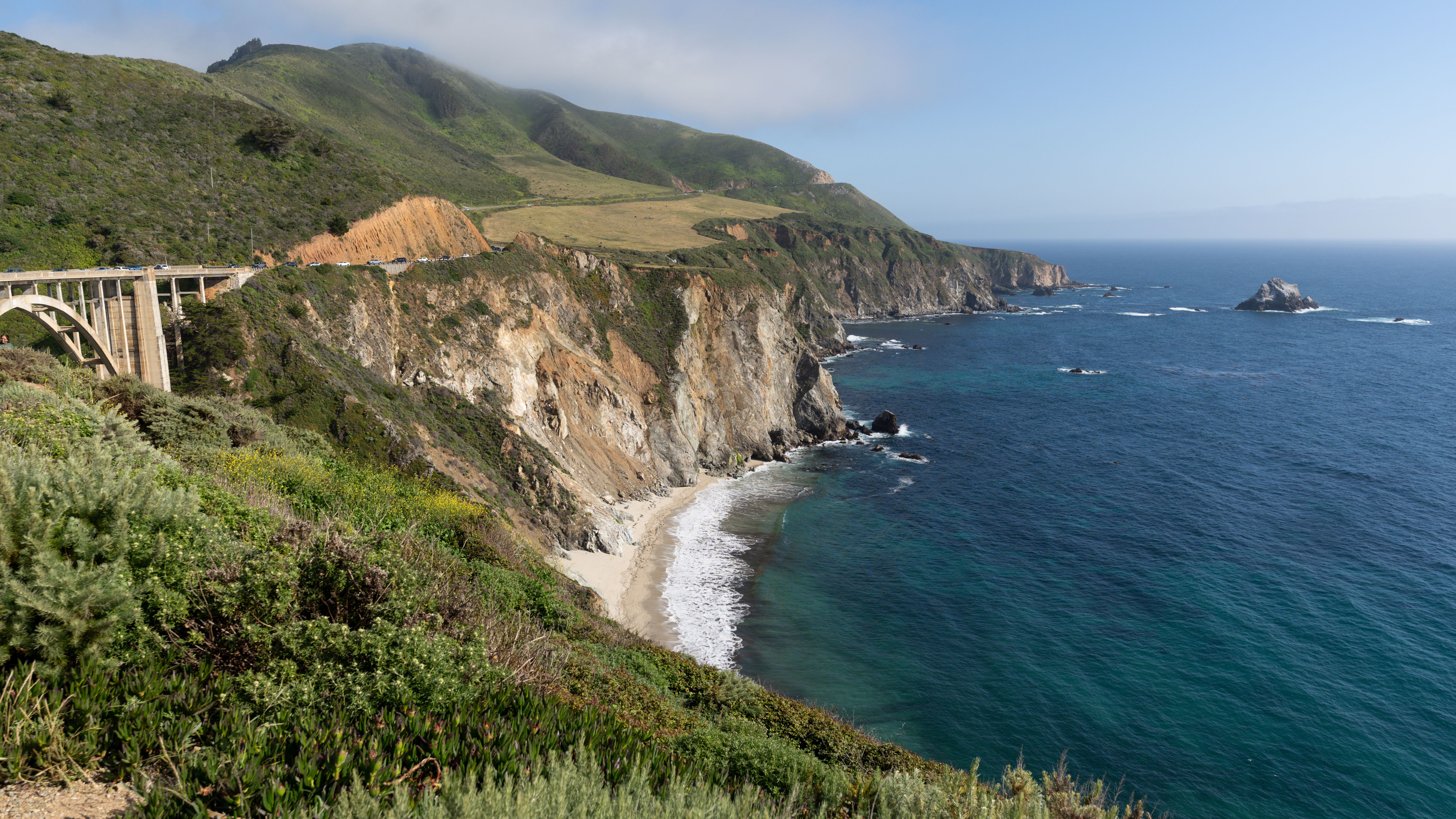 Stunning seaside cliffs and iconic Bixby Creek Bridge along the California coast. Stunning seaside cliffs and iconic Bixby Creek Bridge along the California coast.