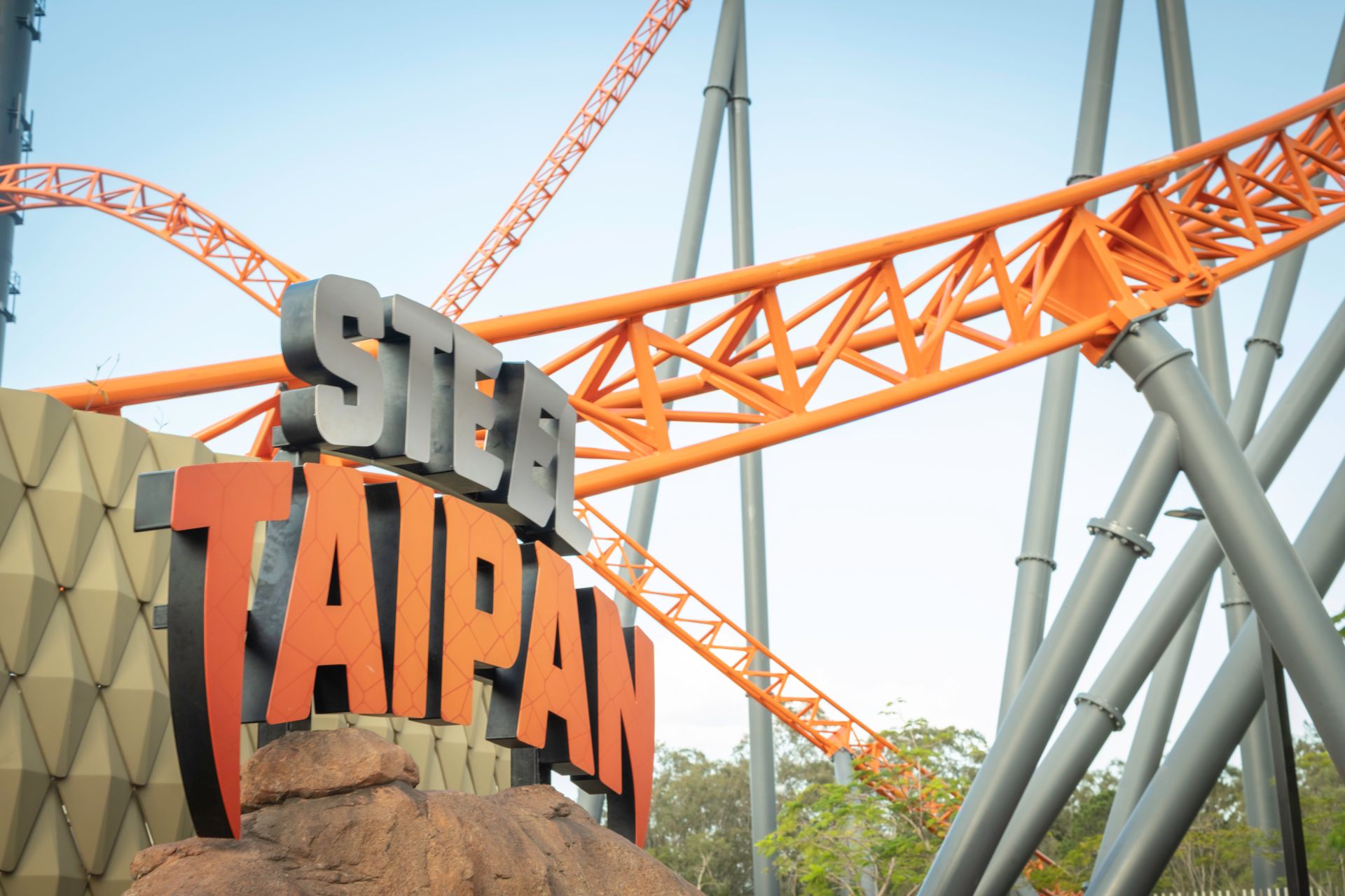 Steel Taipan roller coaster with vibrant steel design at Dreamworld, Gold Coast.