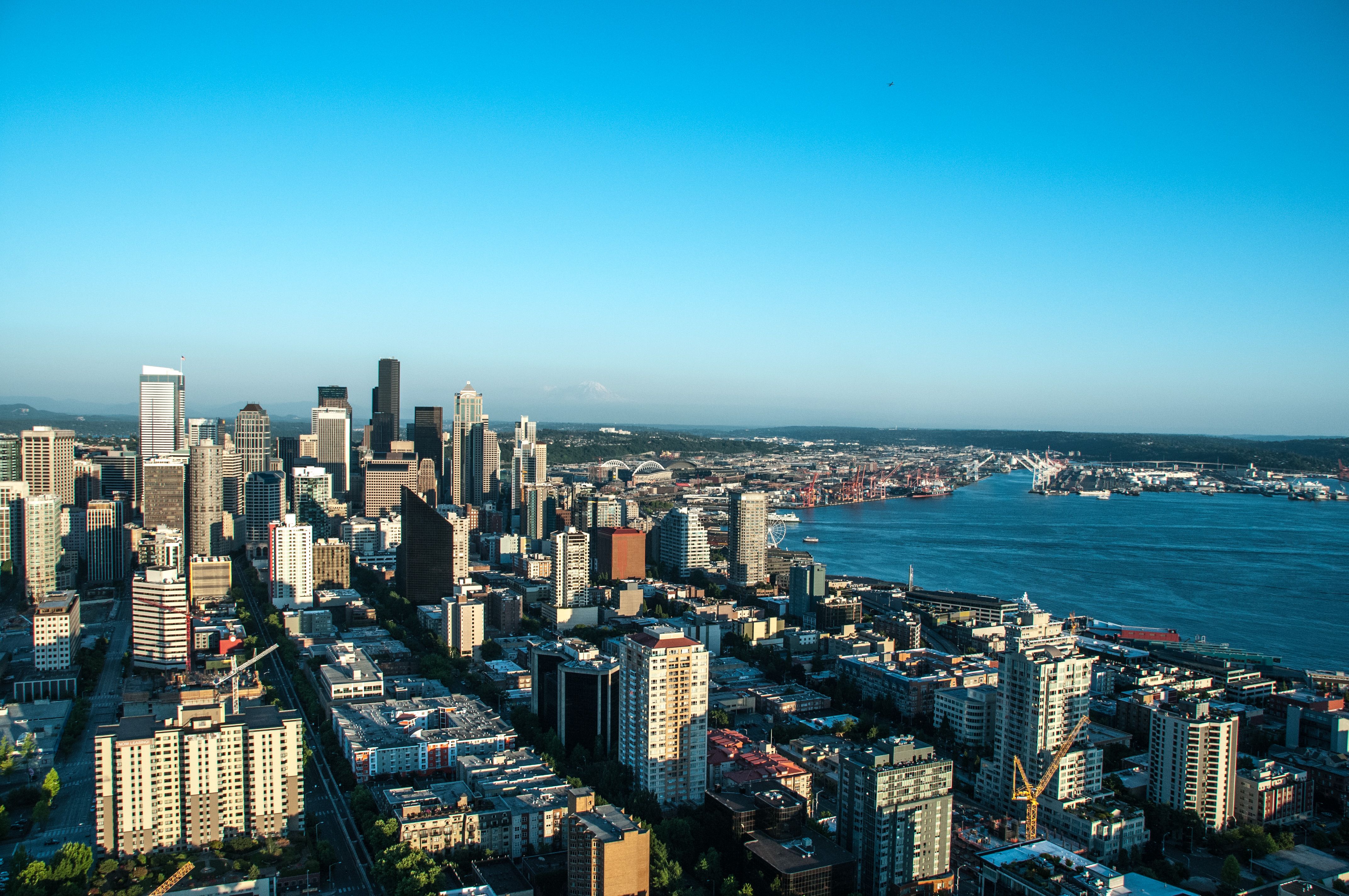 Stunning aerial view of Seattle's skyline and waterfront on a clear day.