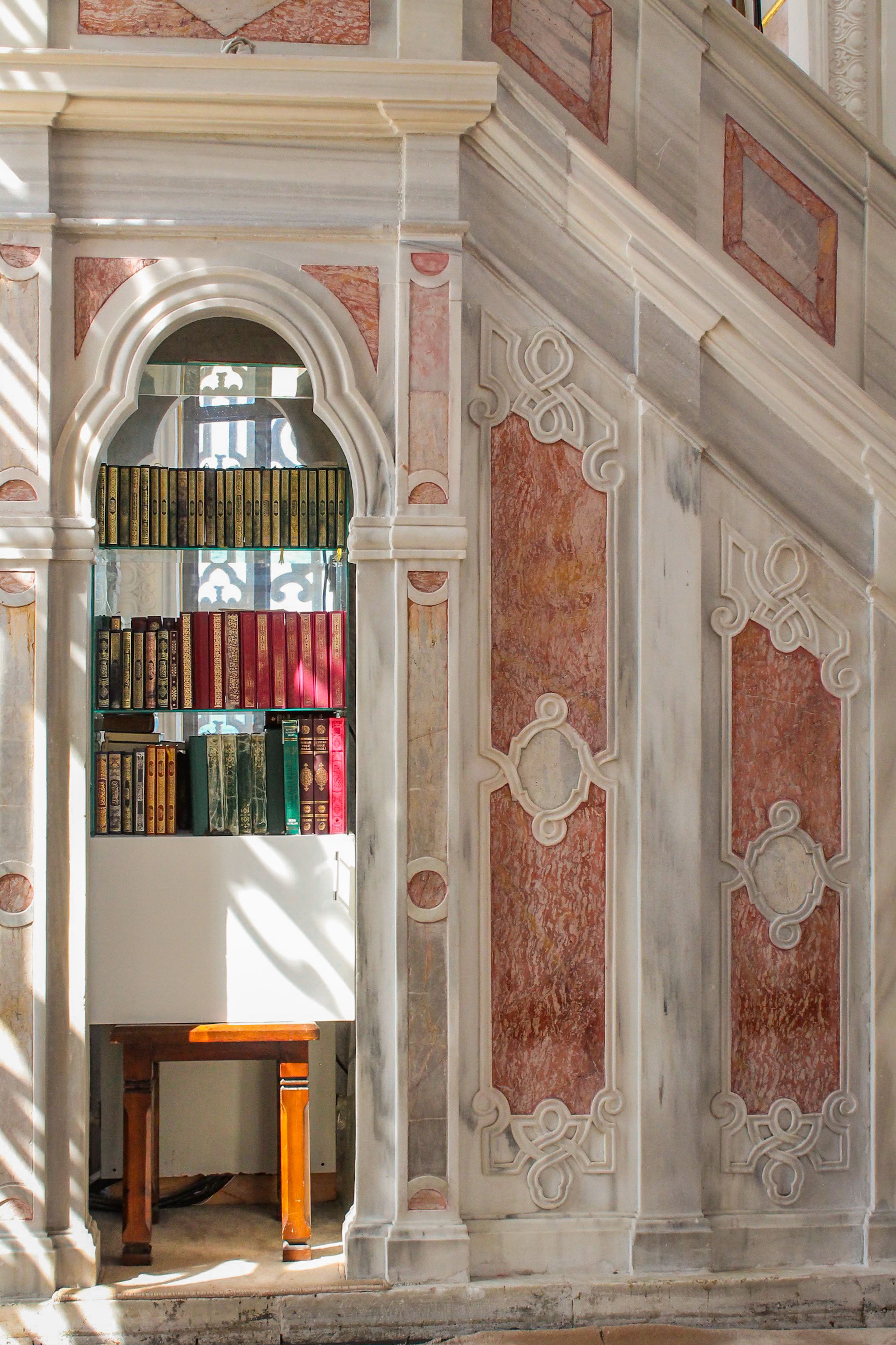 Elegant Library Nook with Ornate Stonework · Free Stock Photo - Elegant Stonework Interior Design
