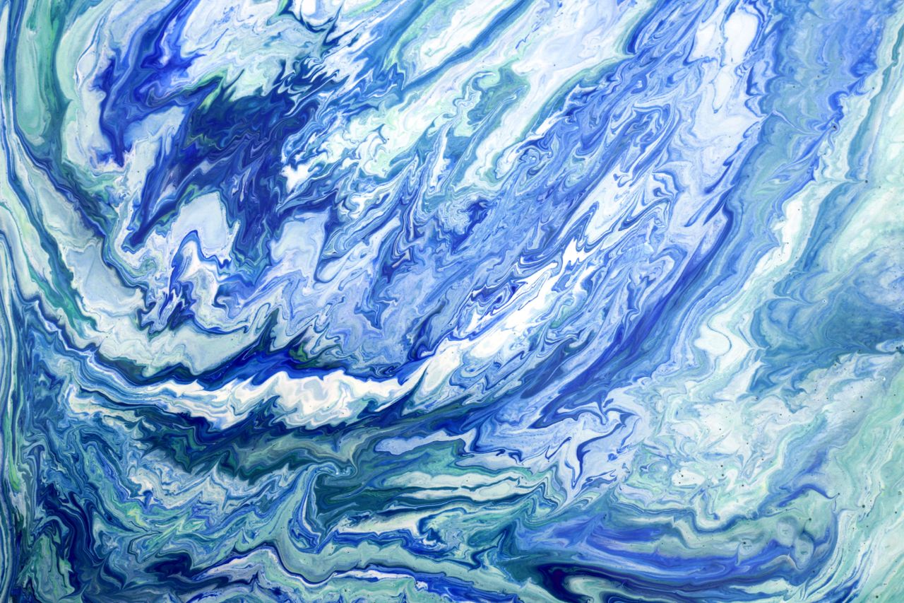 swirling blue and white fluid art creates a mesmerizing abstract effec