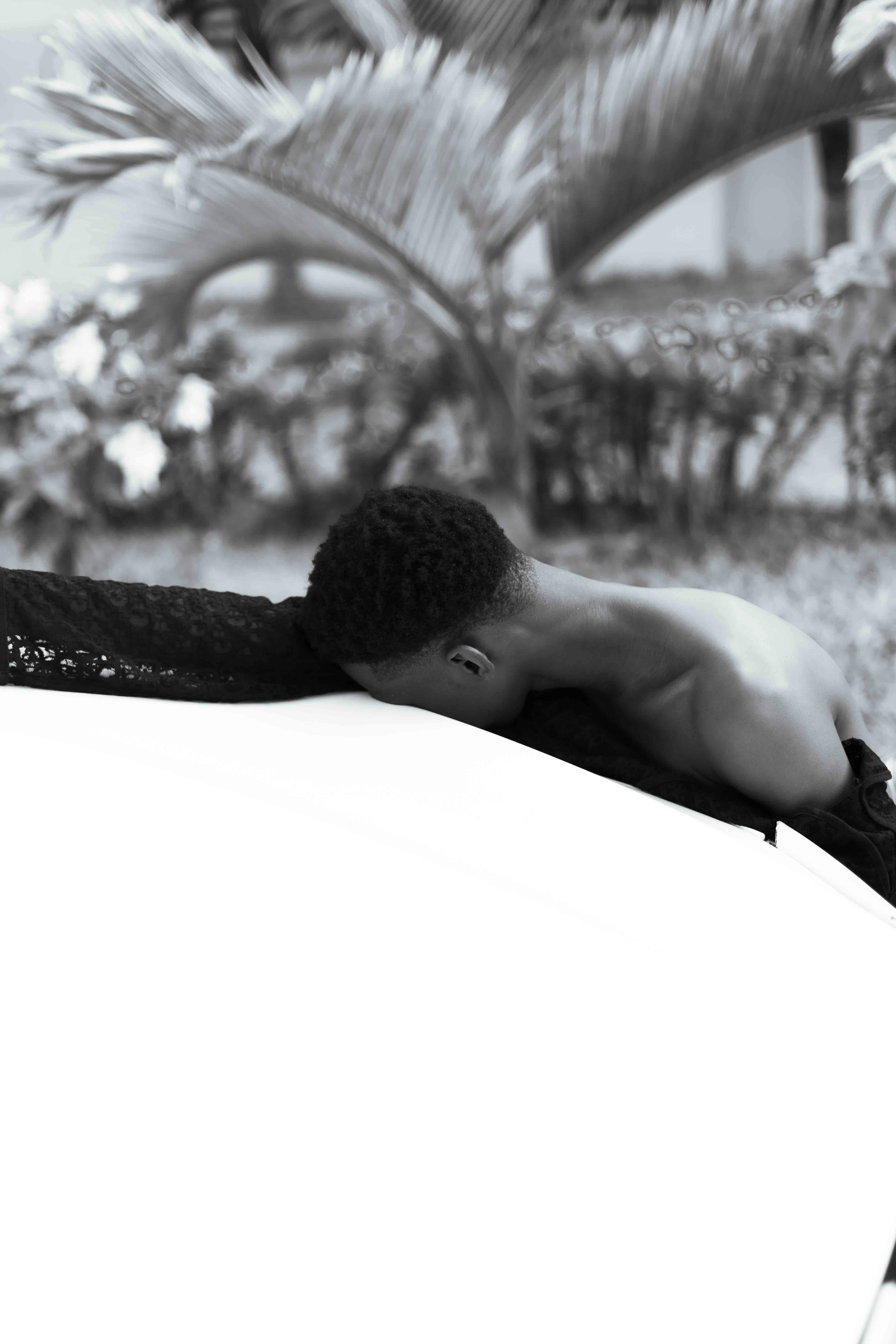 artistic portrait of a young man outdoors