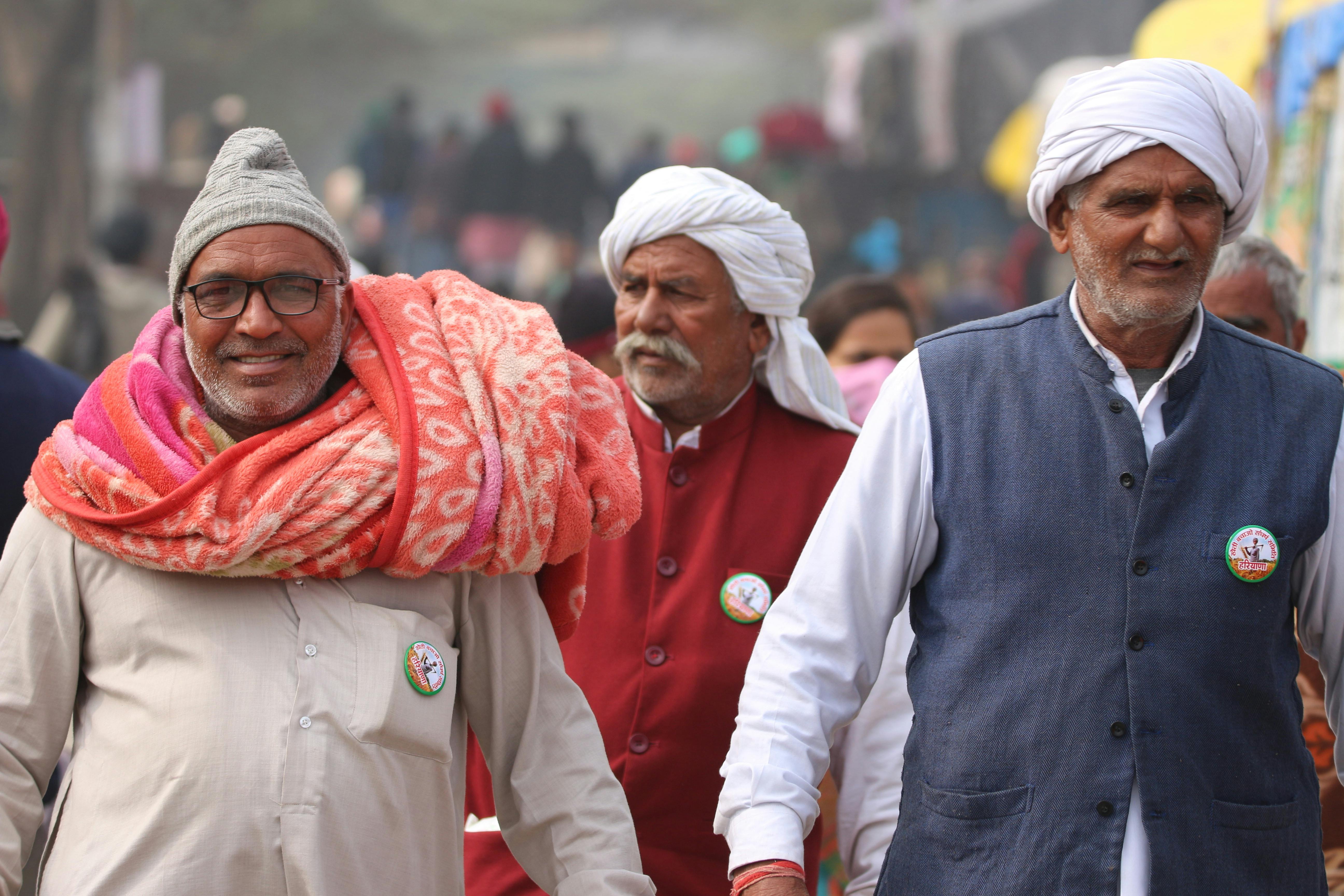 indian men in traditional attire at outdoor event