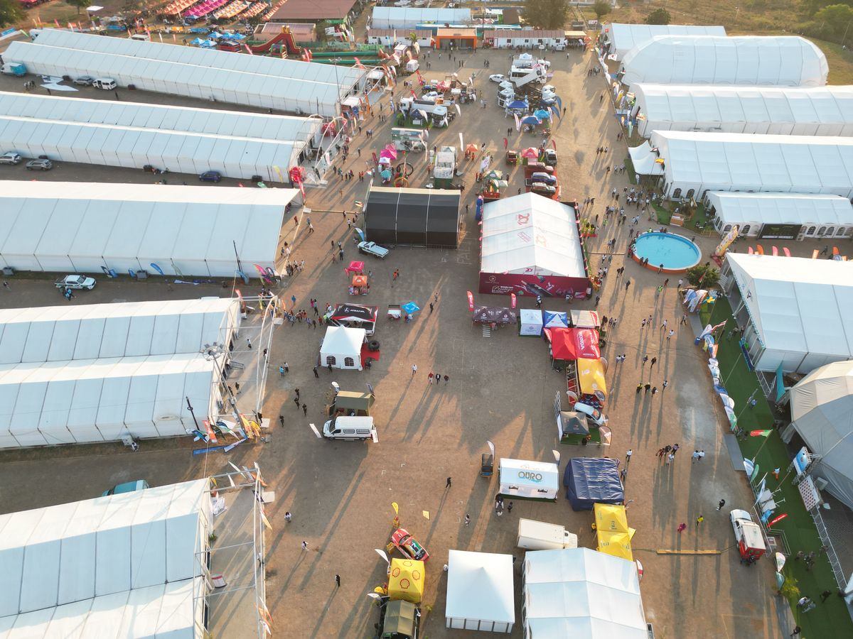 Aerial view of outdoor event with tents