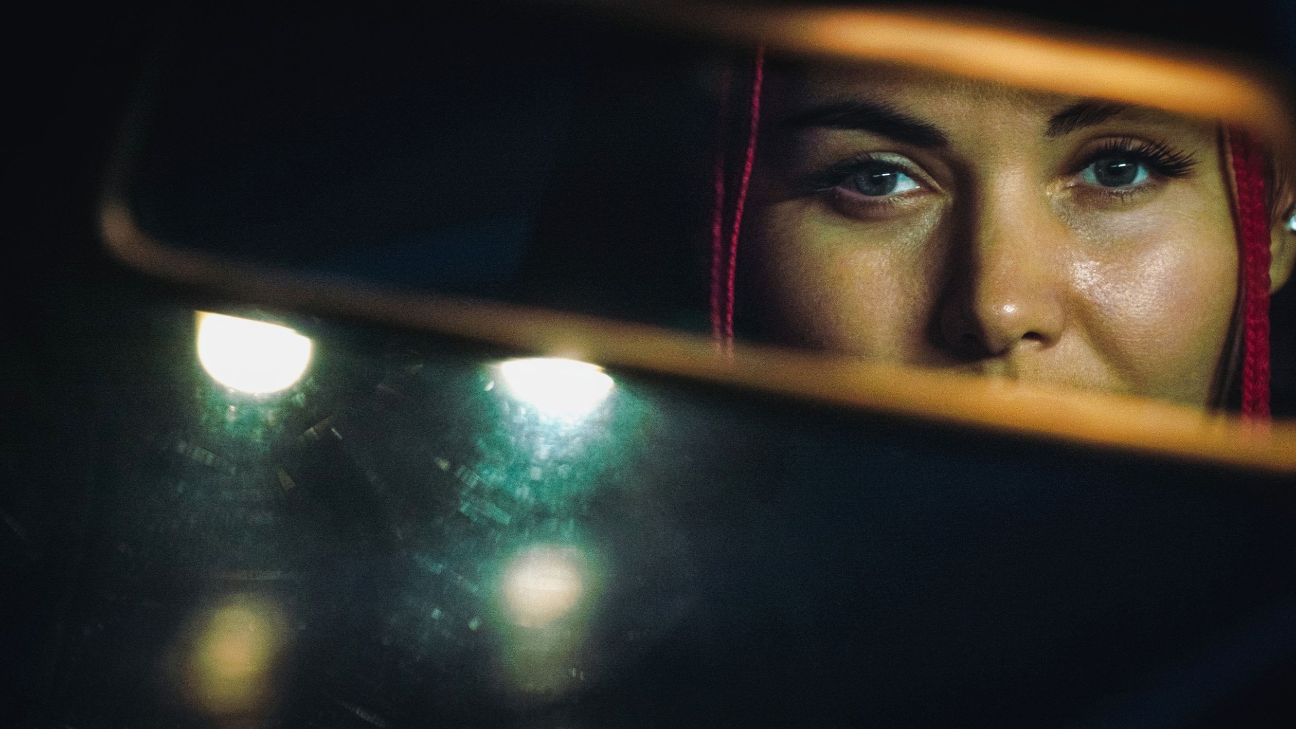 Portrait In Rear View Mirror Woman's Reflection in Car Rearview Mirror at Night · Free Stock Photo