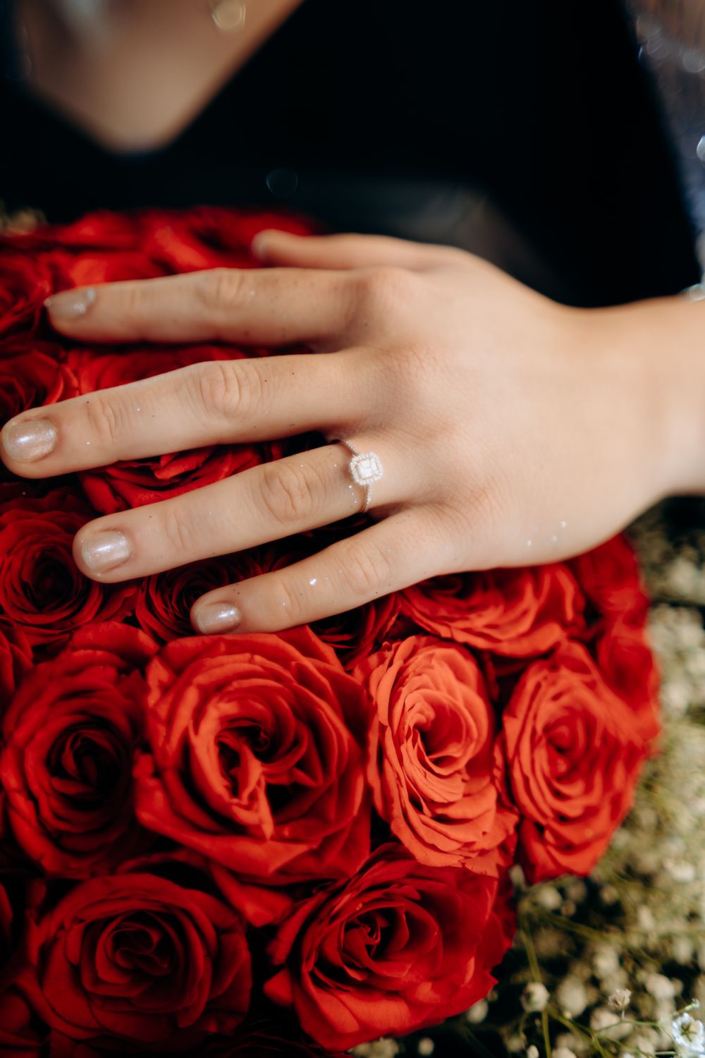 Red Roses Rng Elegant Engagement Ring on Red Rose Bouquet · Free Stock Photo