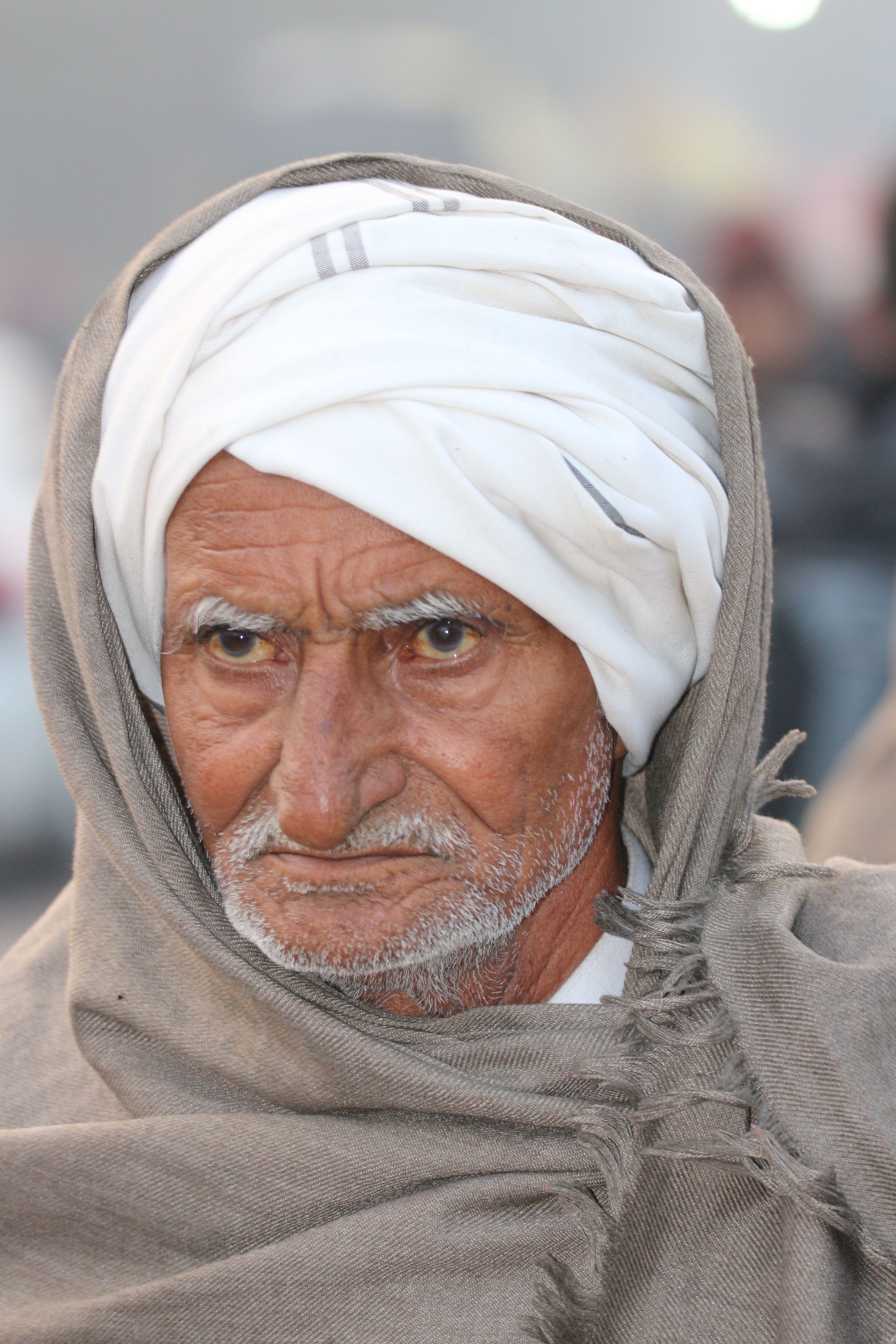 Elderly Man in Traditional Attire Close-Up Portrait · Free Stock Photo