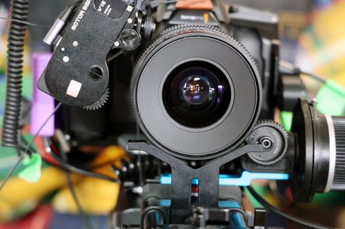 Free Detailed view of a professional camera with lens and equipment. Stock Photo