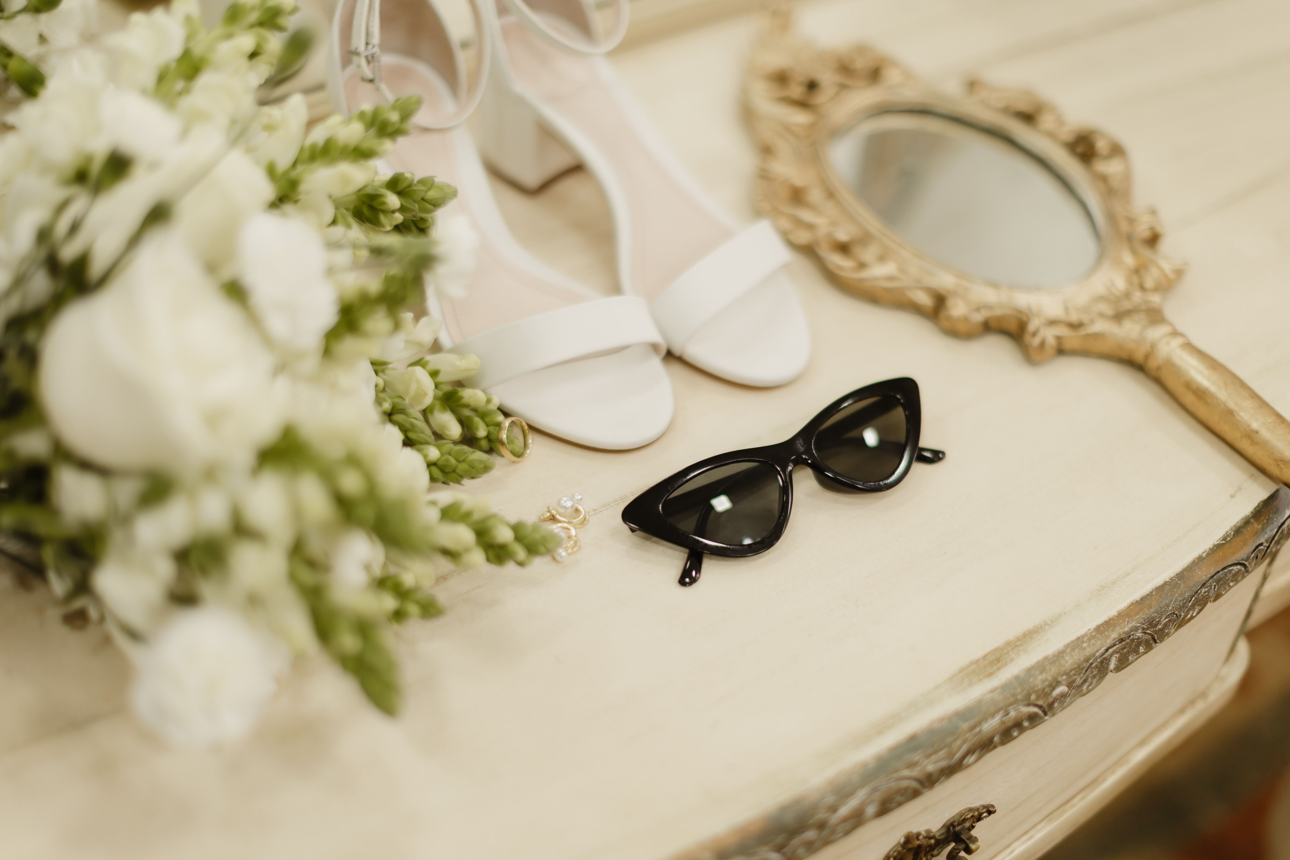 Bridal accessories and shoes for a gown fitting