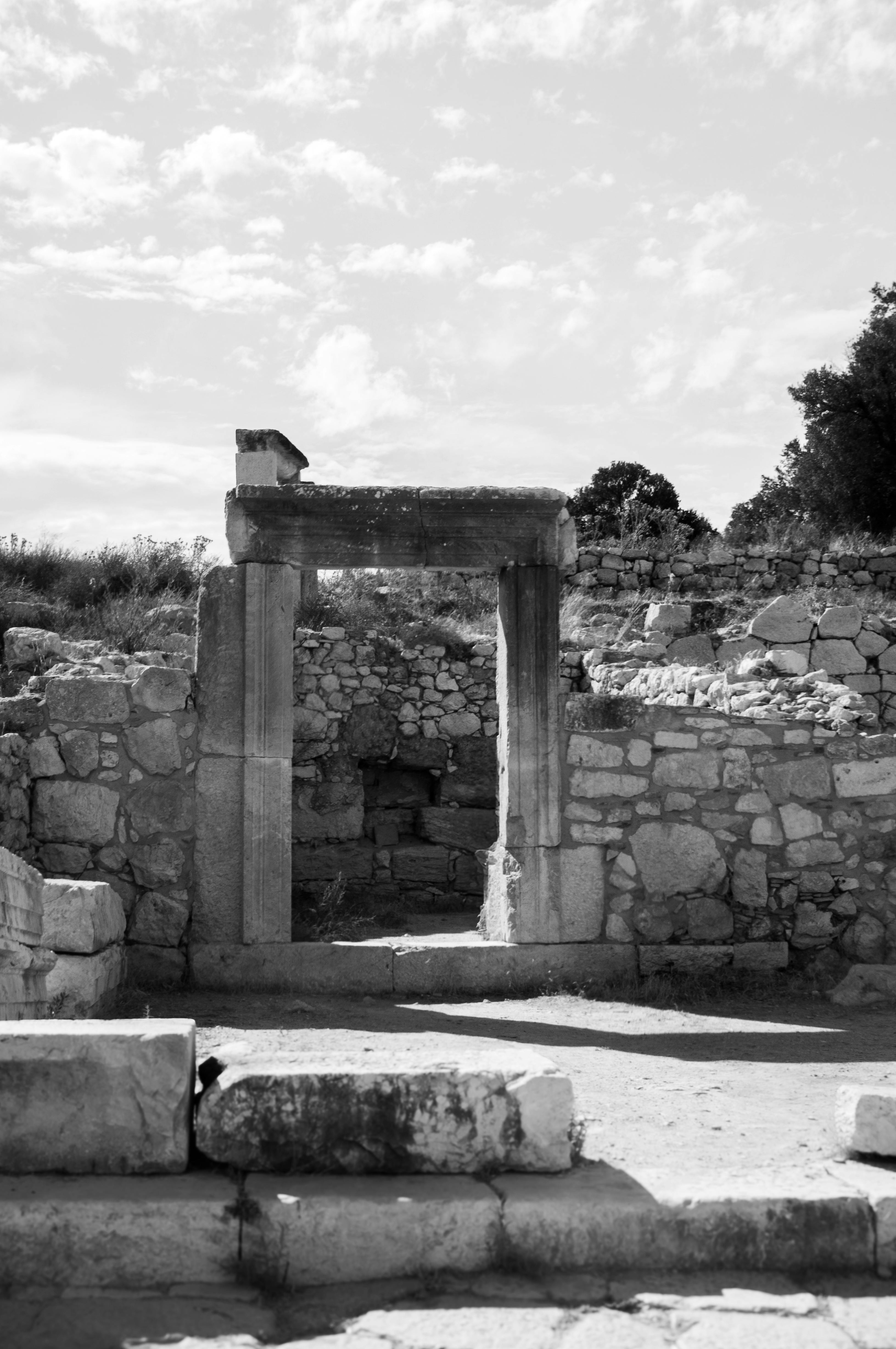 ancient stone archway at archaeological site