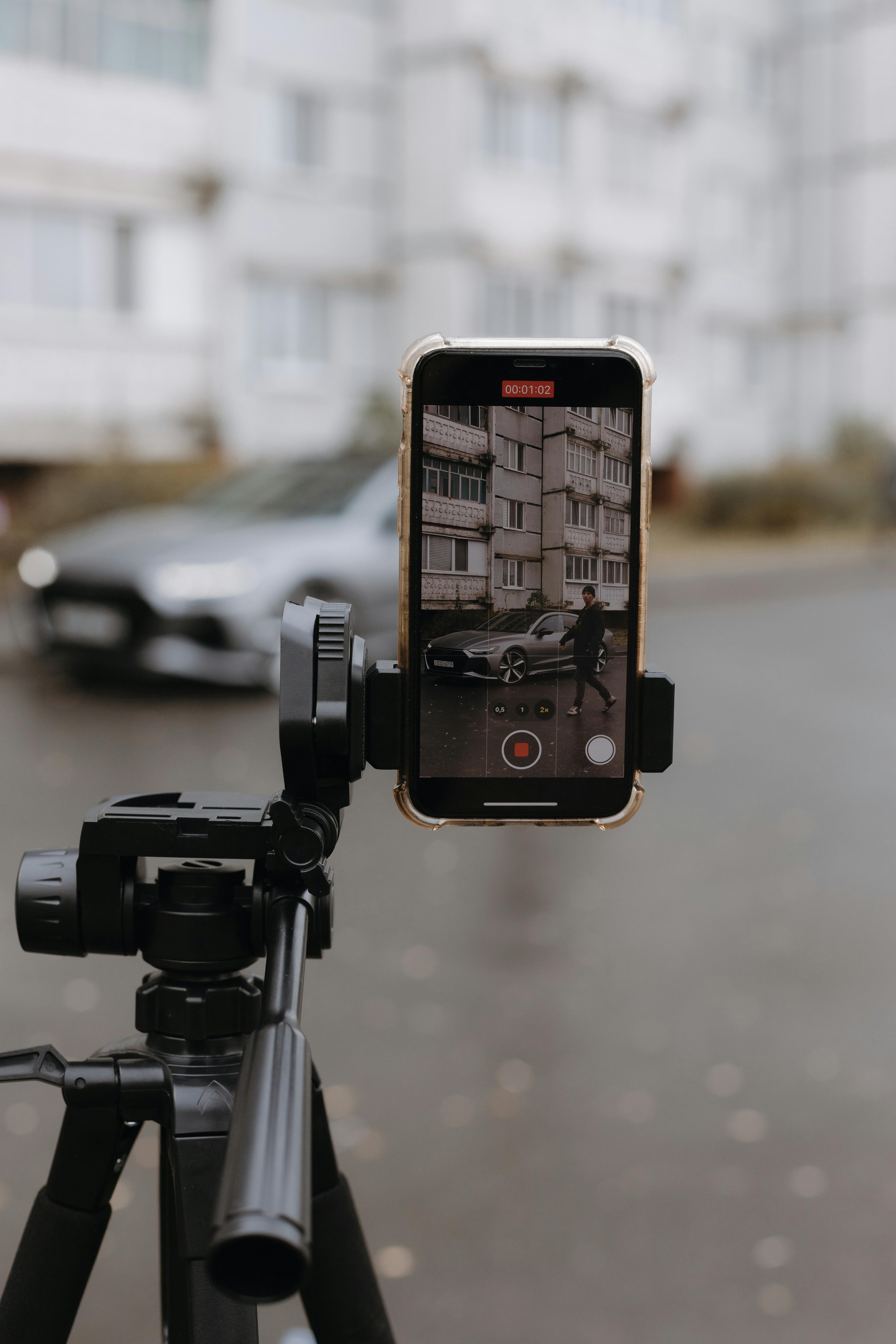 smartphone on tripod recording urban scene