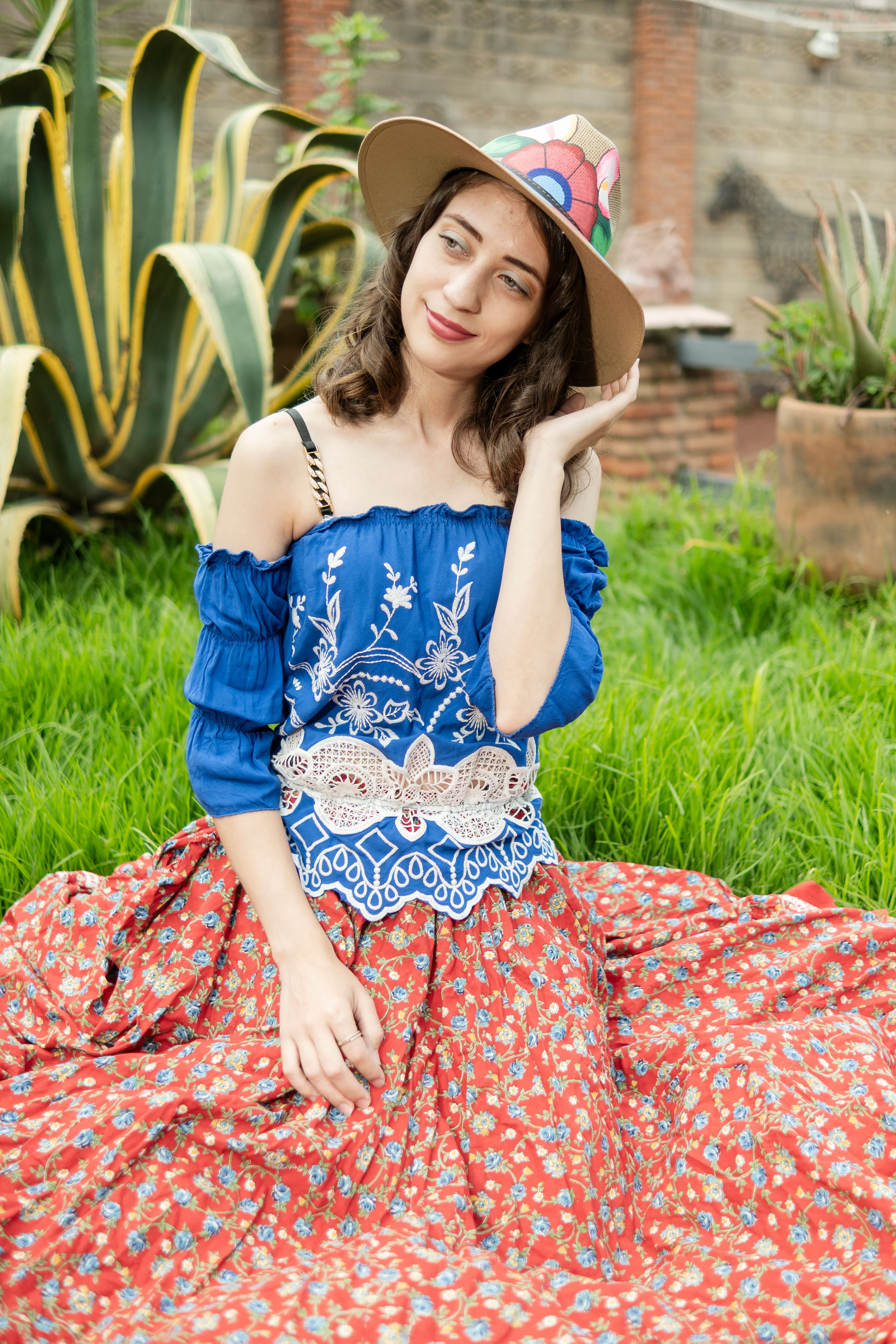 Smiling Woman in Colorful Boho Outfit Outdoors · Free Stock Photo