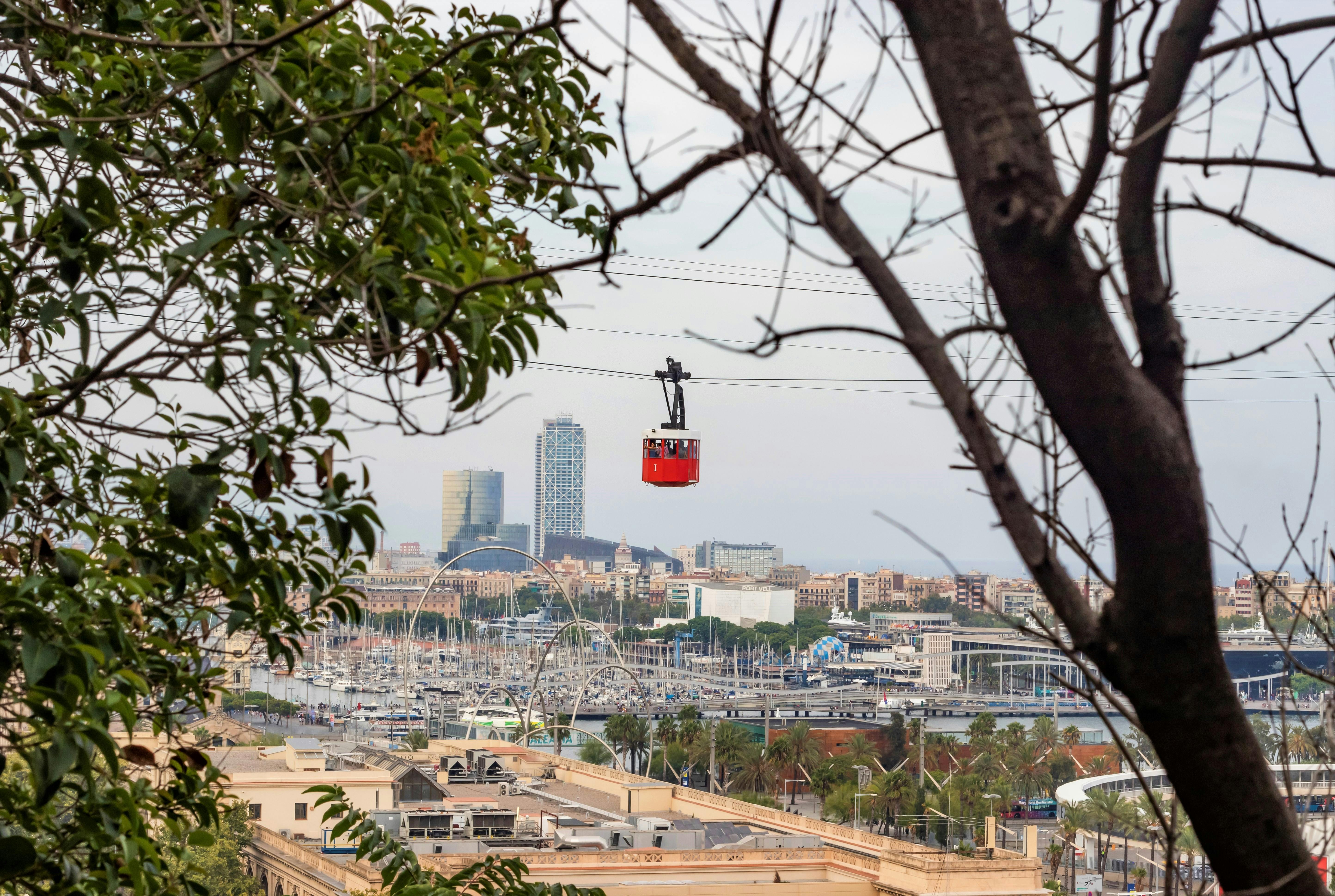 photo of red and white cable car