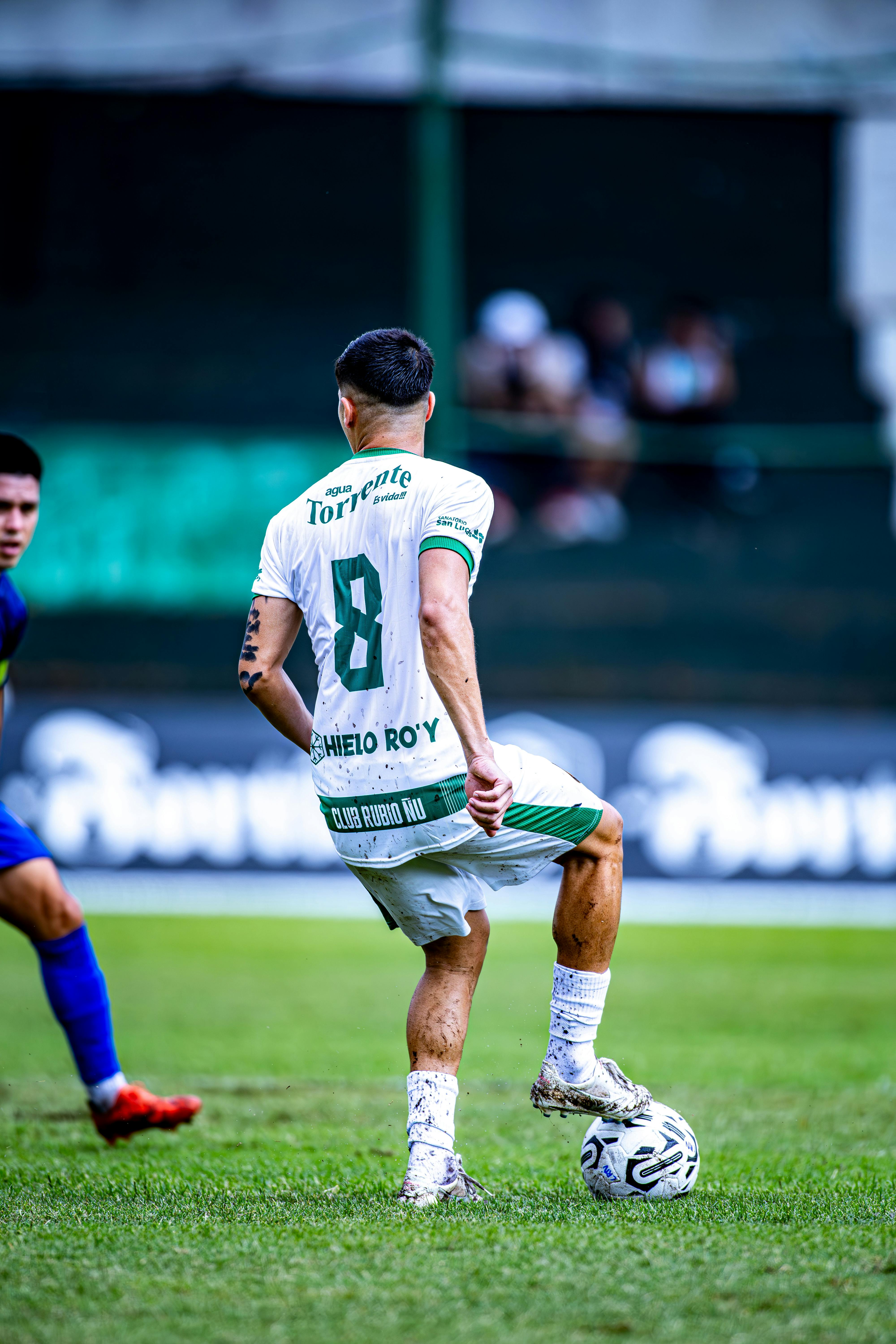 soccer player in action on outdoor field