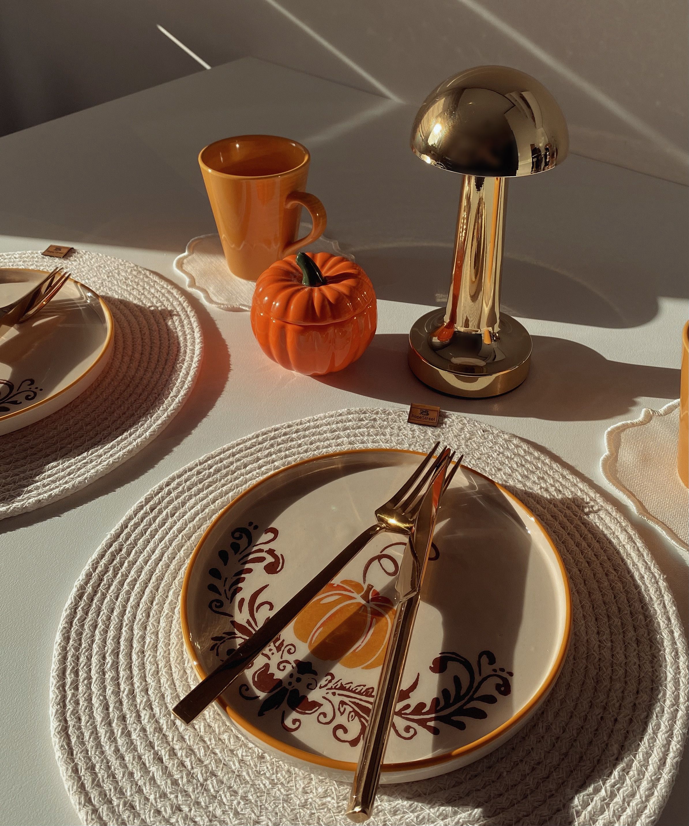 Elegant Autumn Table Setting with Pumpkin Decor · Free Stock Photo