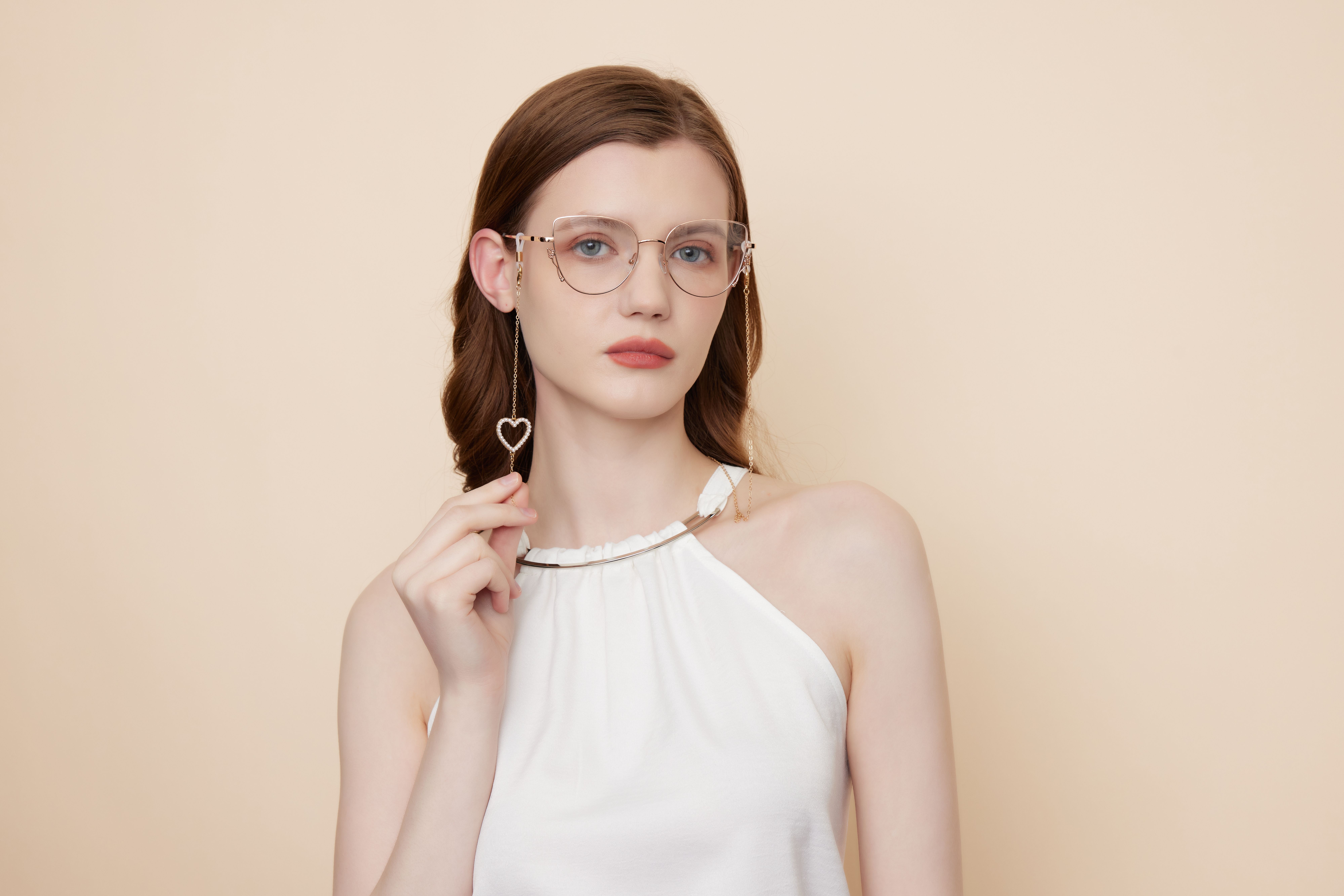 Elegant Female Portrait with Stylish Eyeglasses · Free Stock Photo